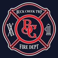 Logo of Buck Creek Township Fire Department featuring a red fire hydrant, ladder, and fire hose on a dark background with the department's name and crest.