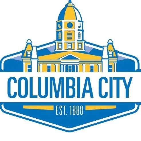 Illustration of a historic building with a dome, labeled Columbia City, established in 1888, featuring blue and yellow colors.