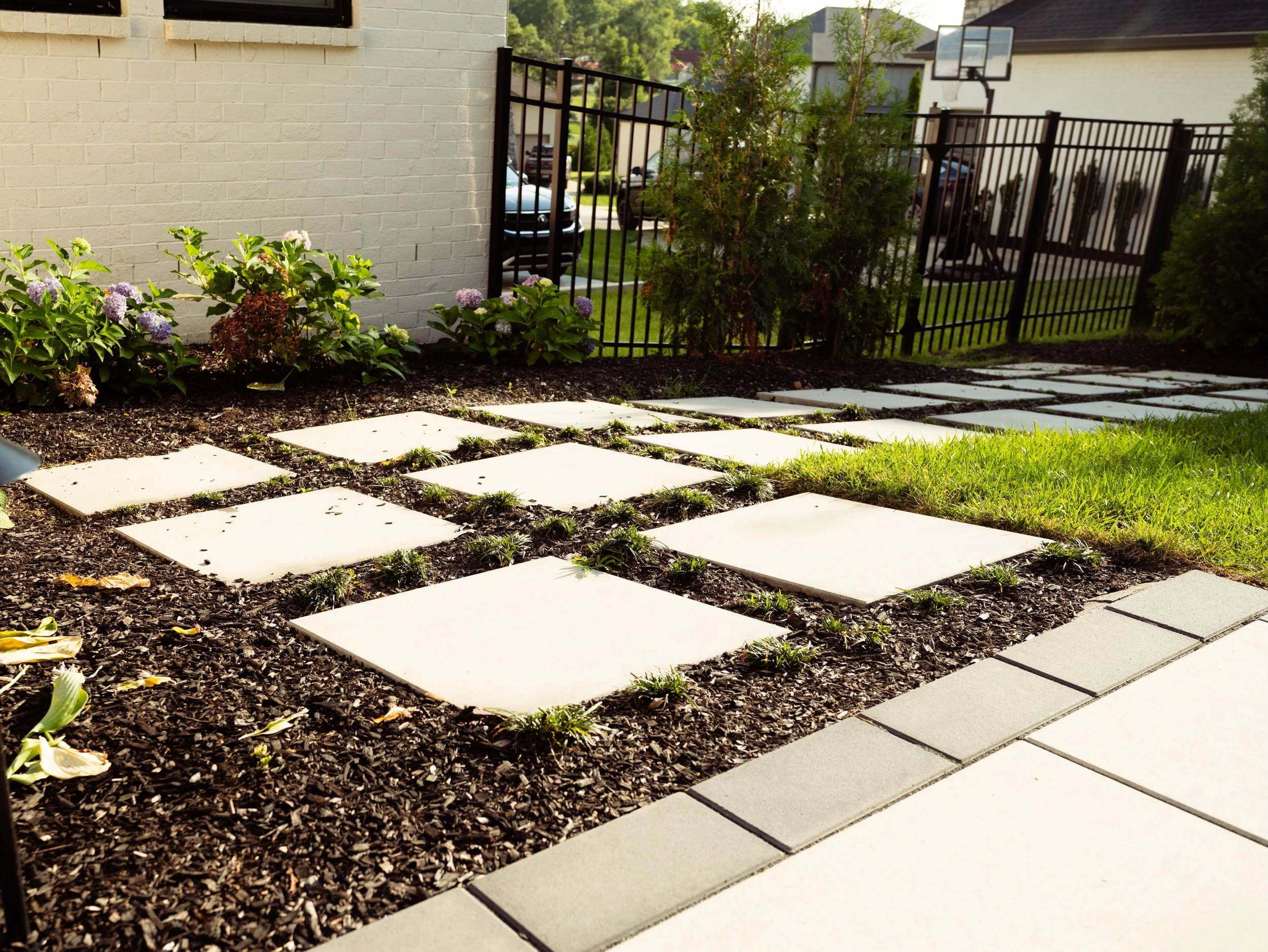 Landscaping is about more than grass and mulch. It's about creating a complete outdoor experience. Custom hardscaping adds function, integrated lighting extends the enjoyment long after the sun goes down, and thoughtful landscaping ties it all togeth