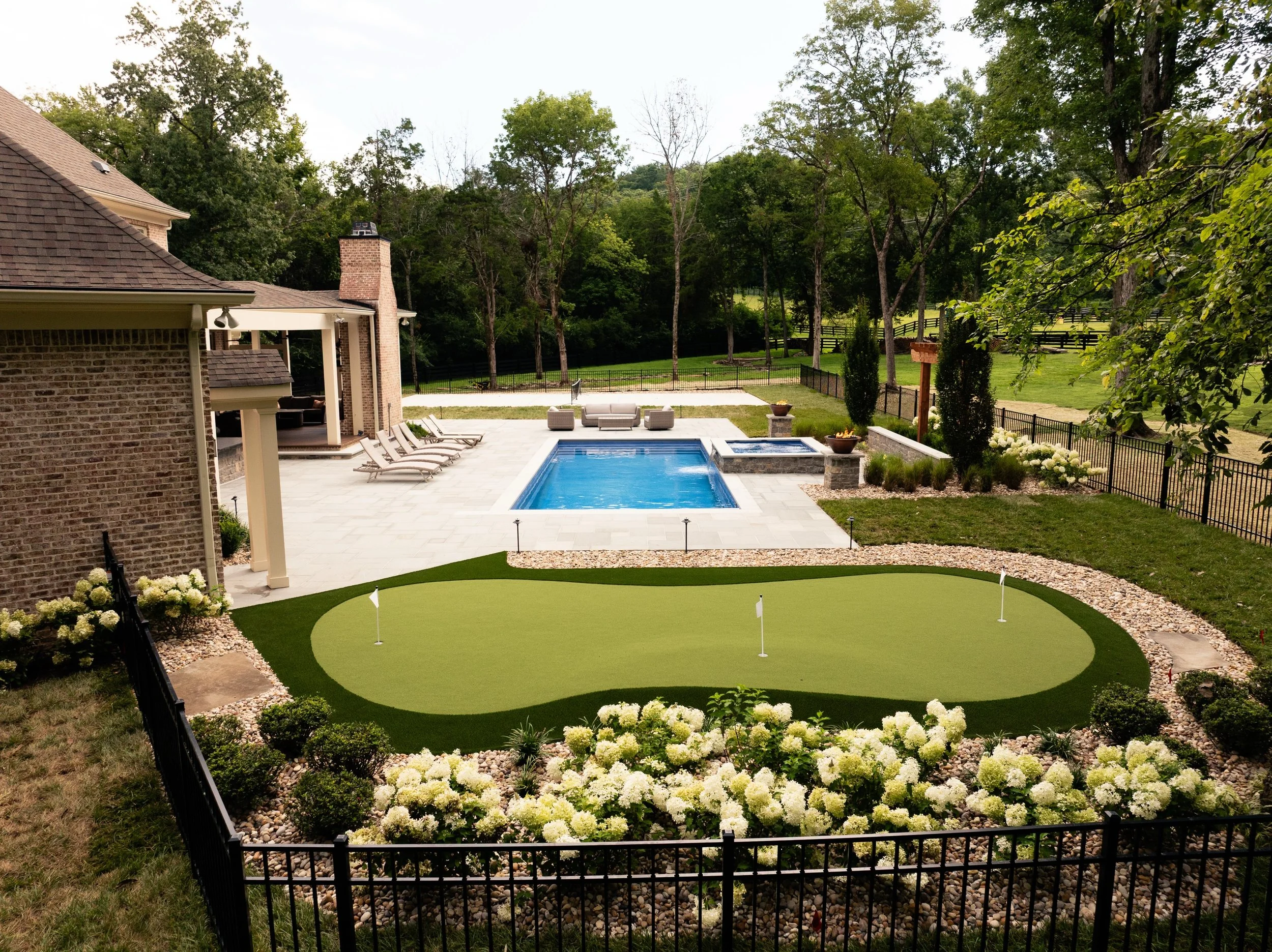 A fully finished backyard isn't just about how it looks&mdash;it's about how you live. A custom pool and spa give you a place to relax, fire features keep the space inviting long after the sun goes down, professional landscaping adds beauty and value