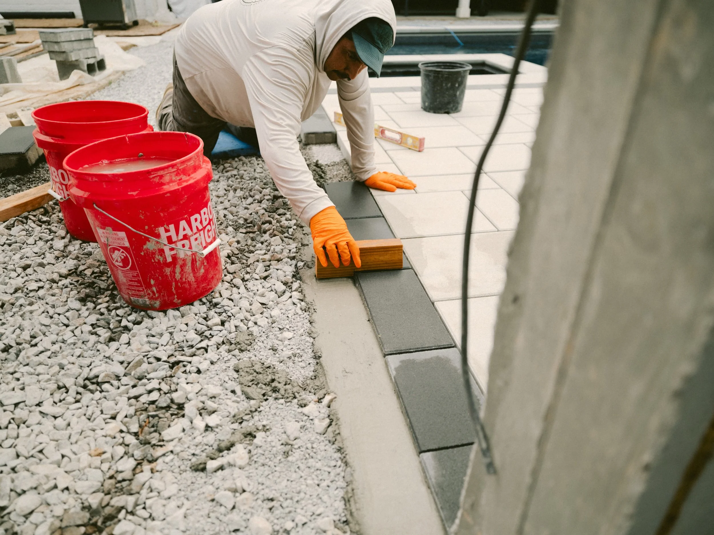 Custom hardscaping is what gives a yard structure, function, and character.

From custom stonework and retaining walls to paver patios, walkways, and built-in features, every detail is designed to make the property work better while adding another le