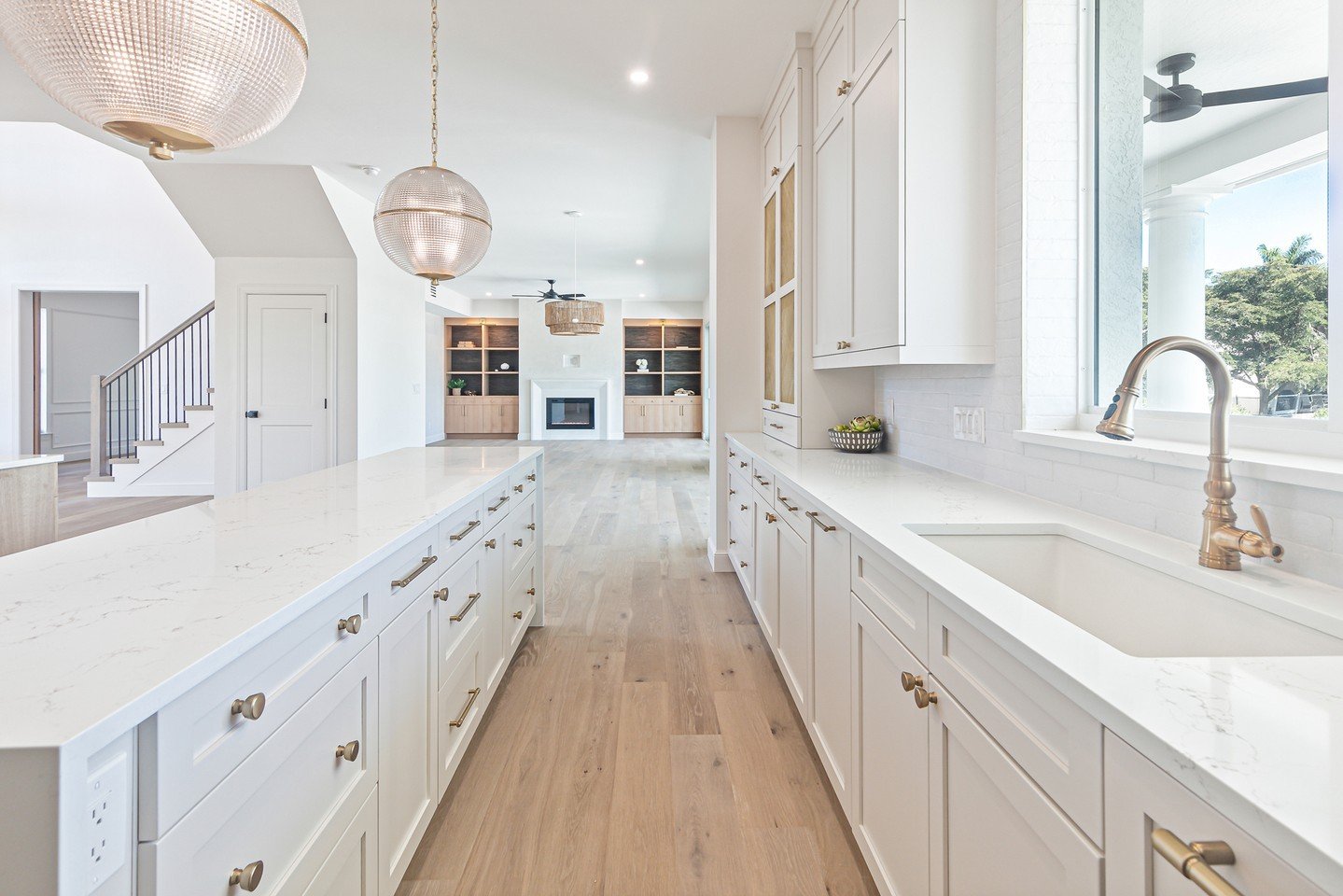 When Hurricane Ian flooded a cherished family home, it presented an opportunity for a young and growing family to modernize it to suit their tastes and needs. Every surface of the house was transformed, starting with beautiful engineered hardwood flo
