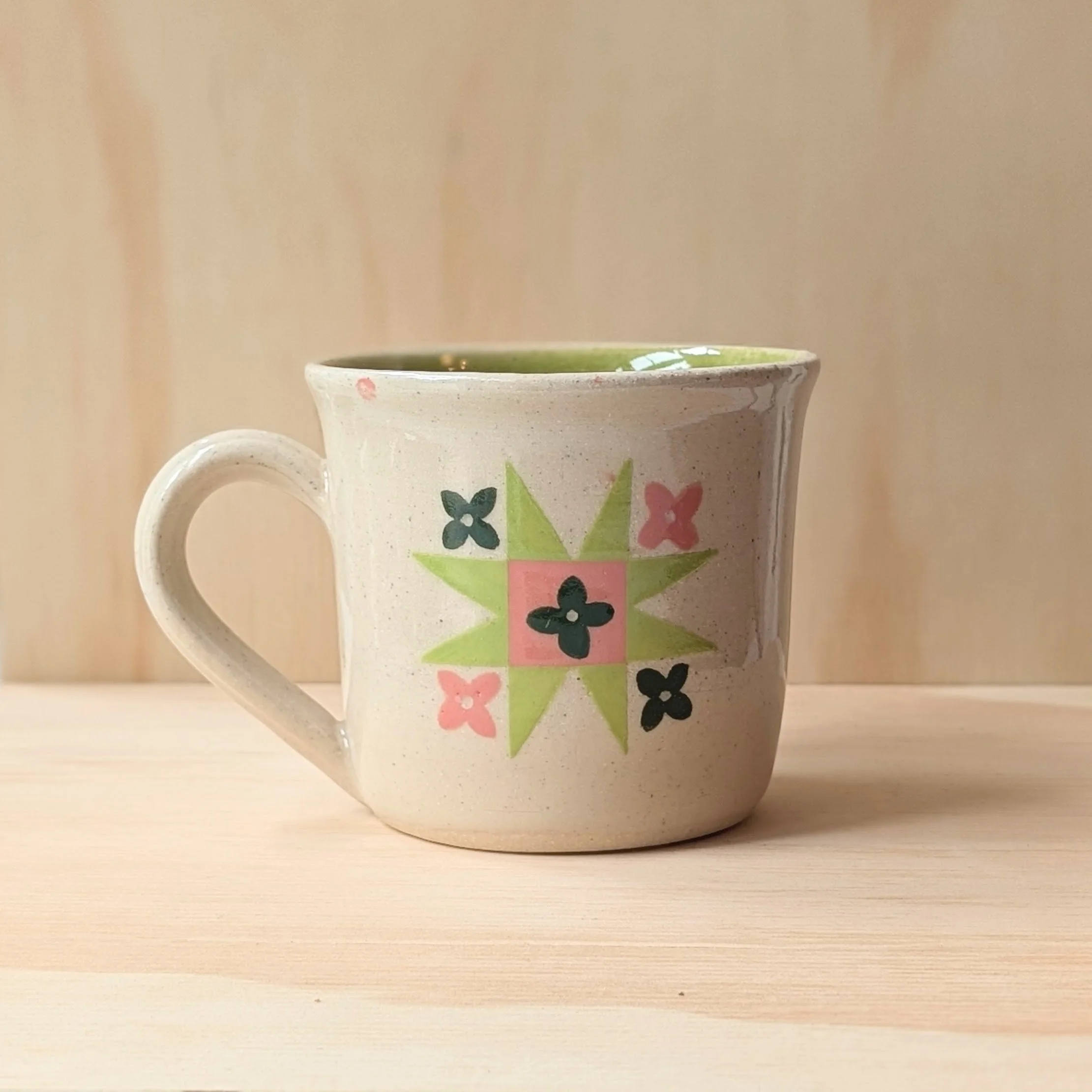 pink and green flower quilt star mug