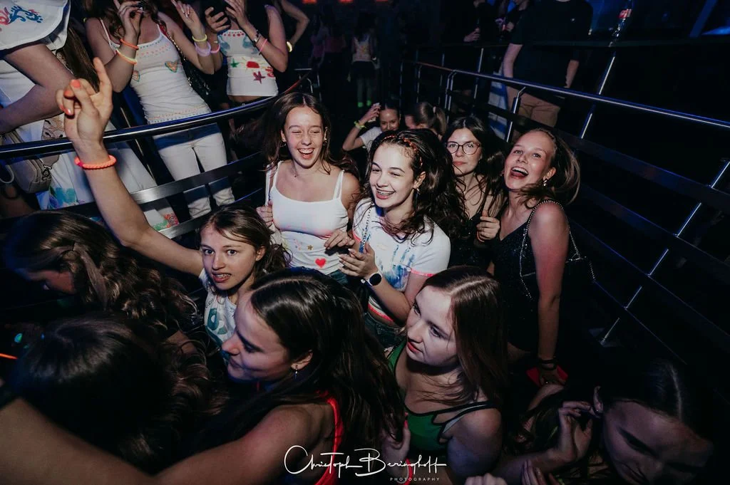 Young women dancing and having fun at a party.