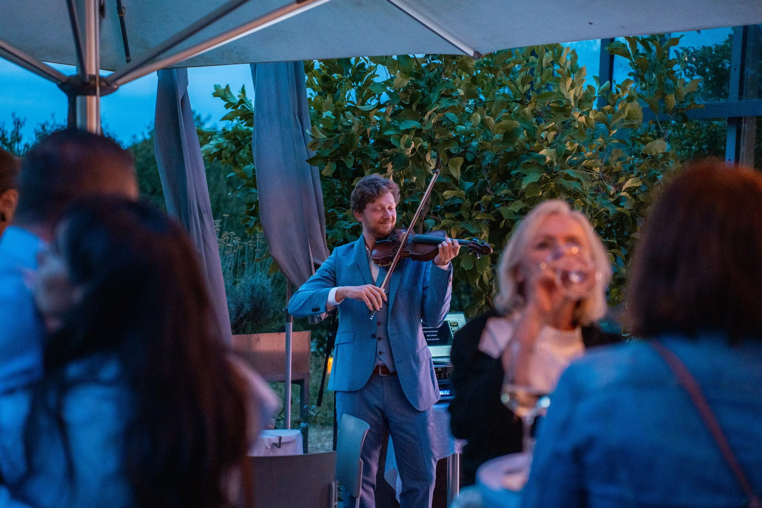 nikolaus playing violin event