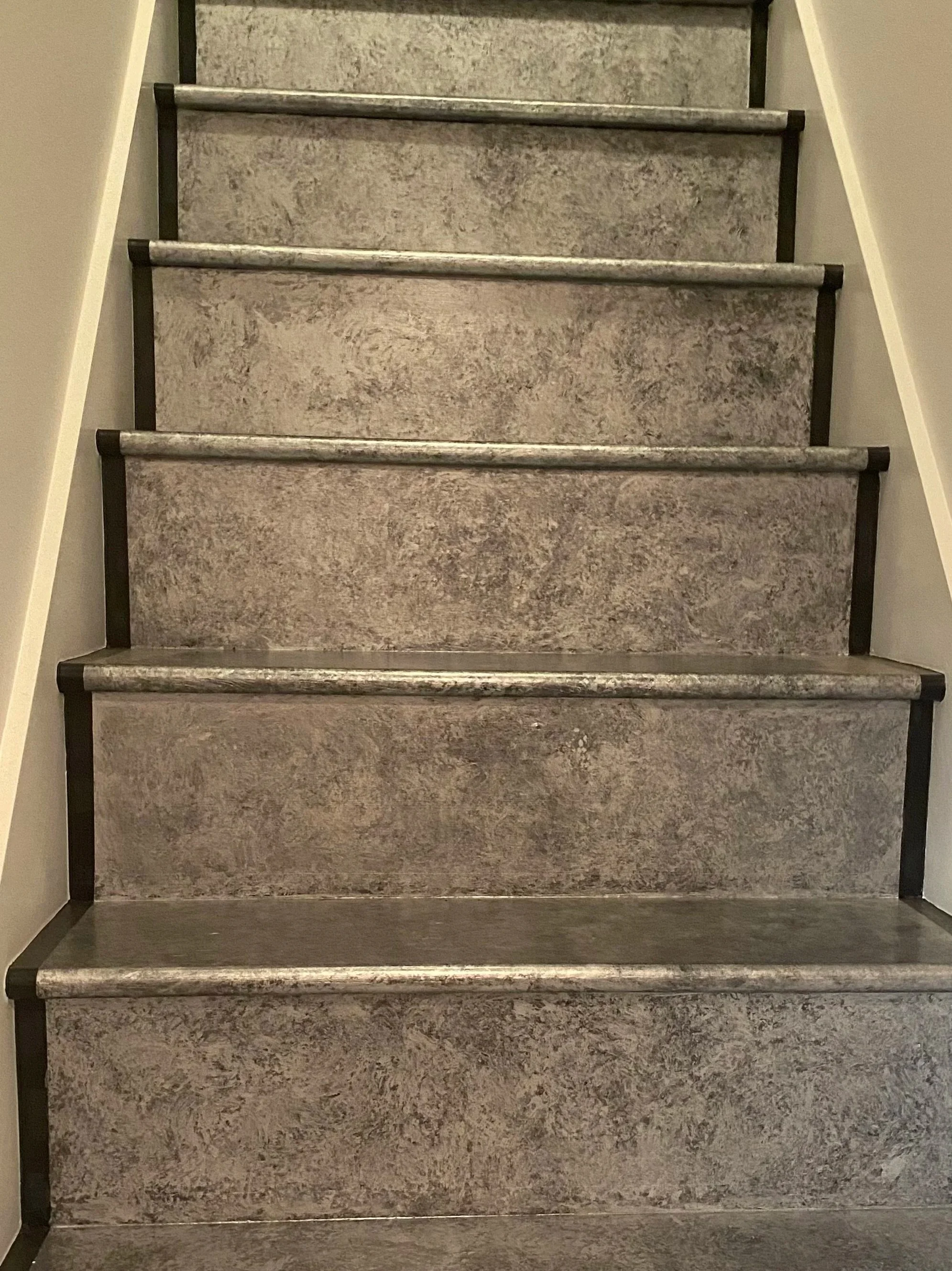 Stairs in faux hammered iron