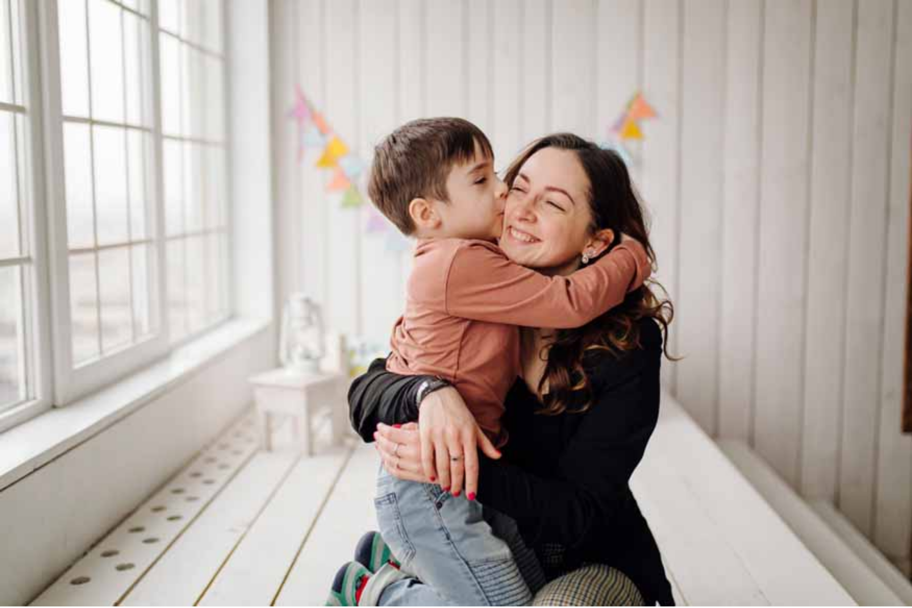 Mother and baby smiling