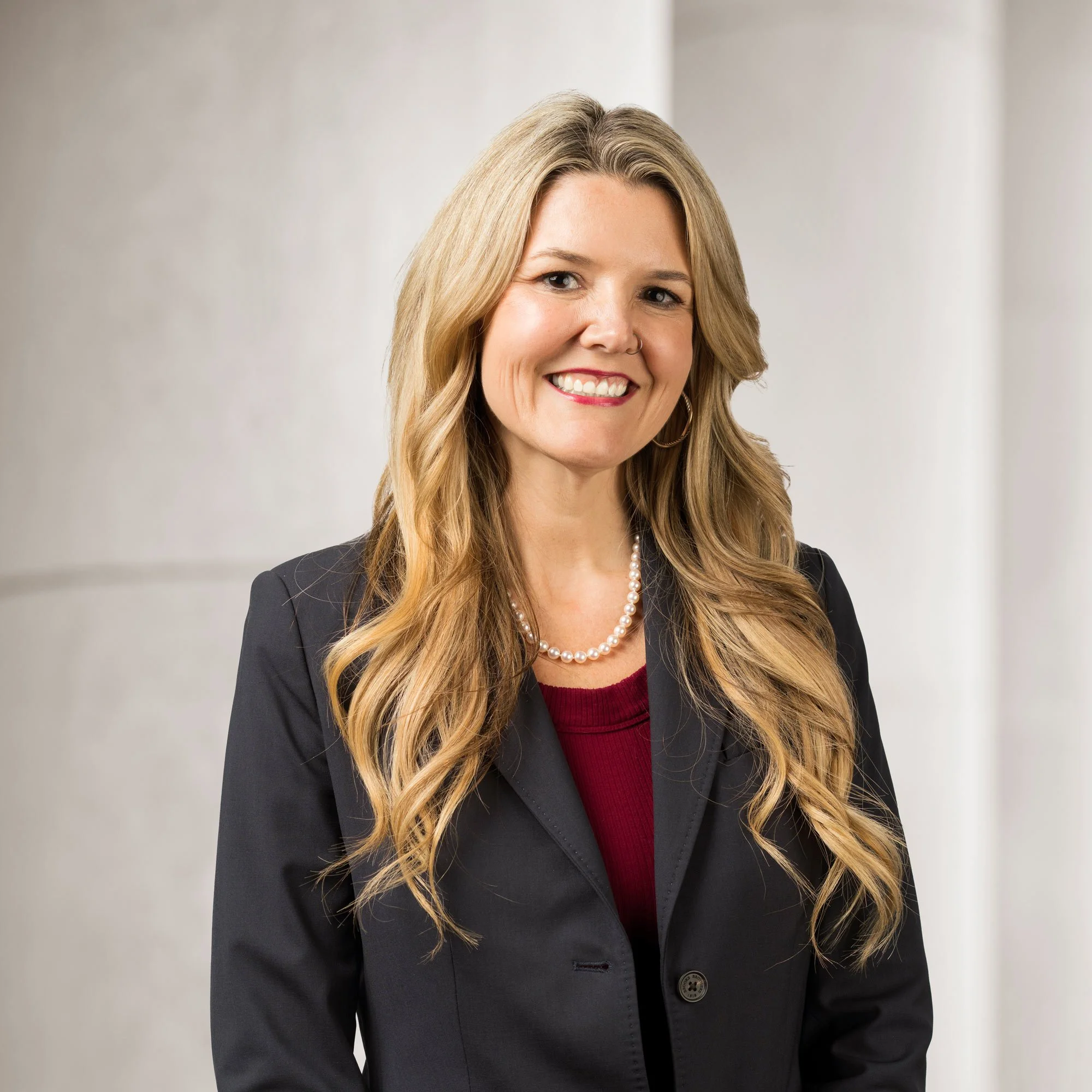 Portrait of Kathleen T. Donnelly, Associate at Baughman Kroup Bosse, on courthouse steps.