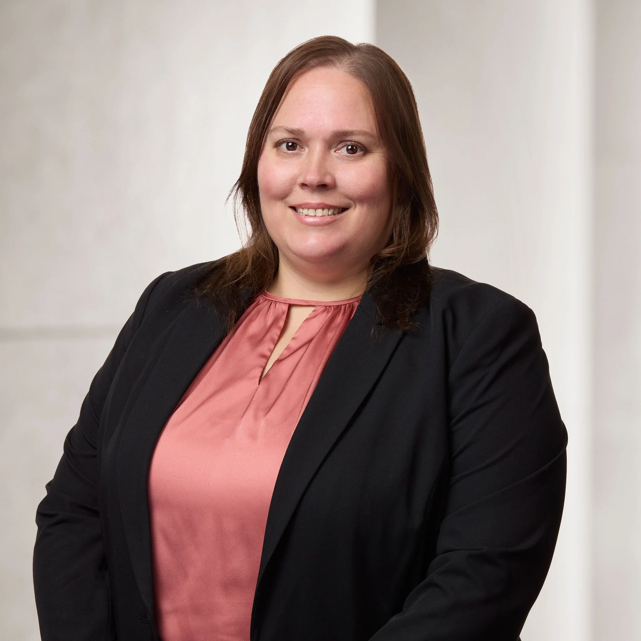 Portrait of Deborah Betterton, Senior Legal Analyst, Human Resources, and Office Manager at Baughman Kroup Bosse, on courthouse steps.