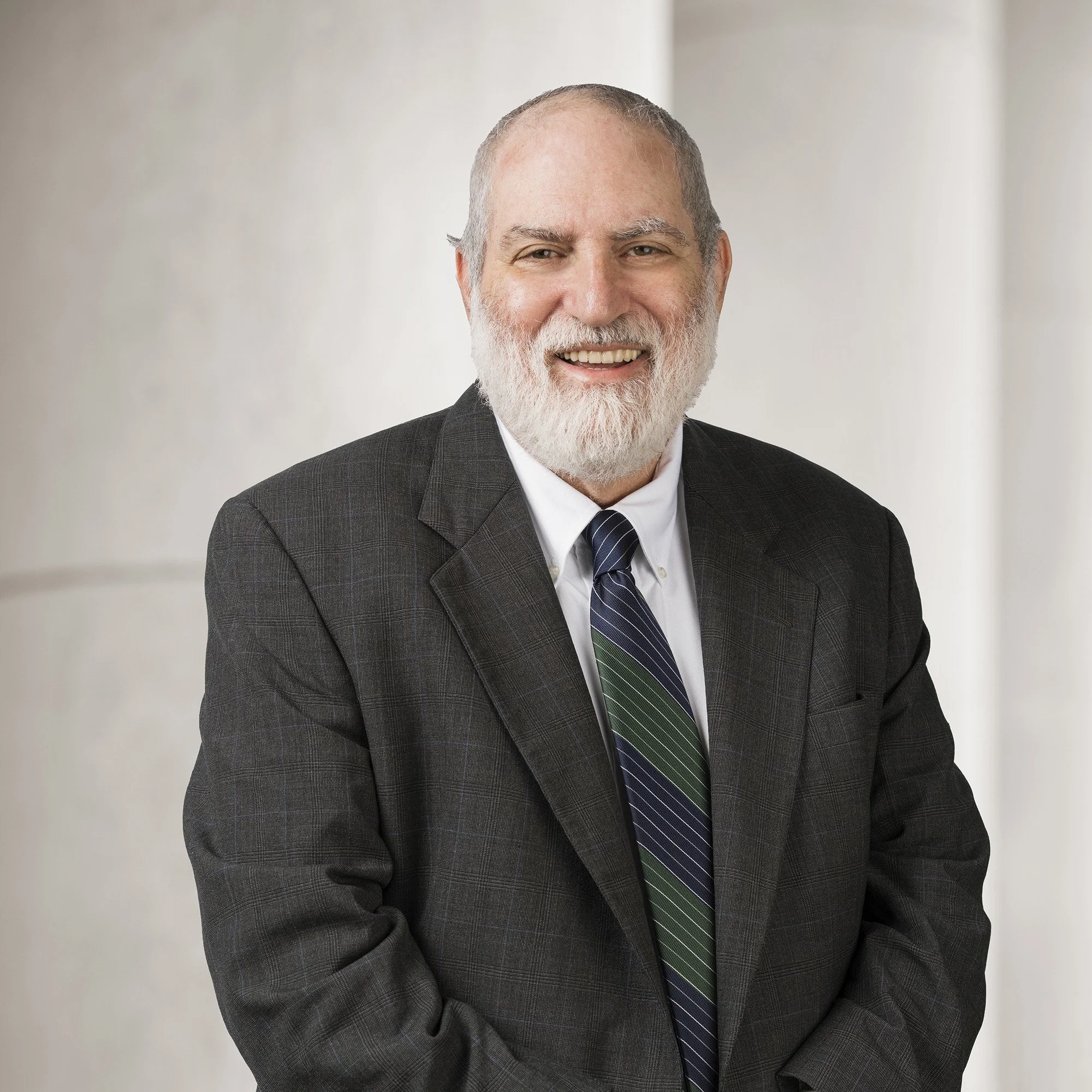 Portrait of Donald N. Hornstein, E- Discovery Specialist at Baughman Kroup Bosse, on courthouse steps. 