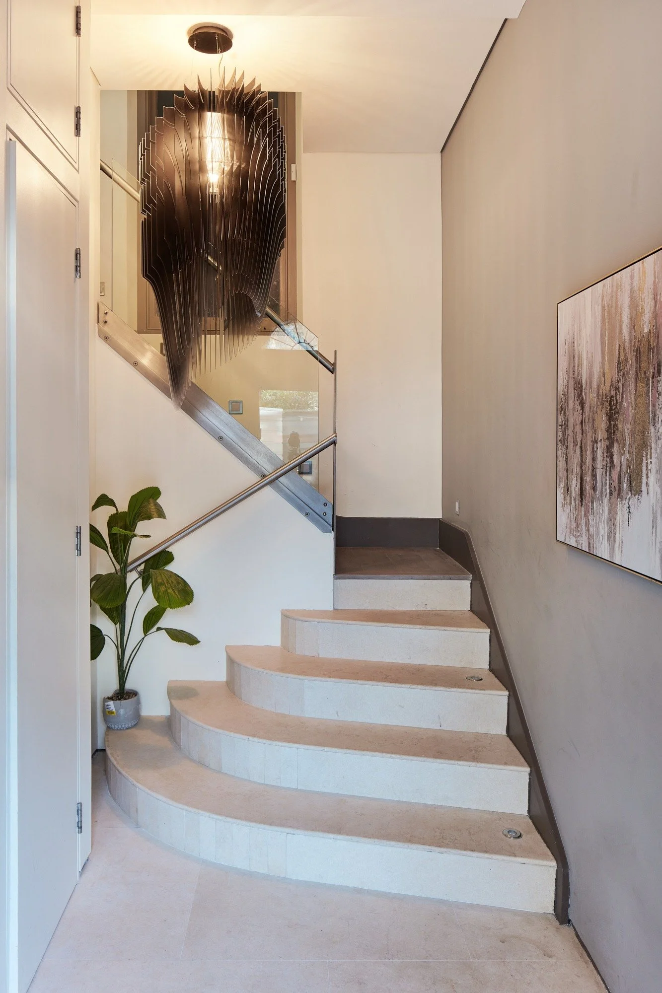 Decorative lighting adorns the staircase entrance