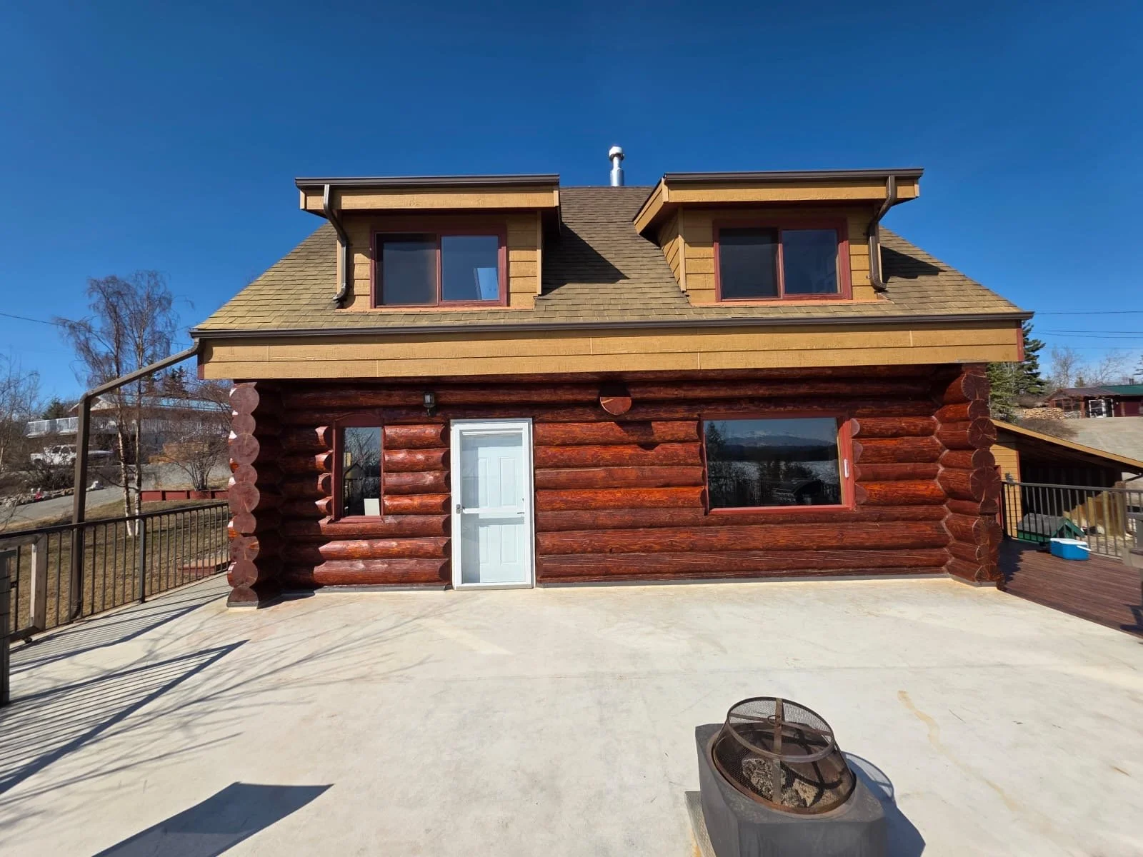 Sanded and Re-stained this log home for a bright, fresh touch!