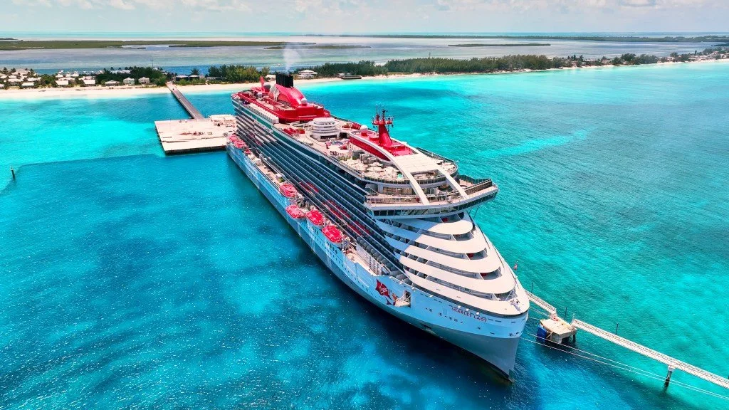 The iconic red hammock on a Virgin Voyages sea terrace balcony.