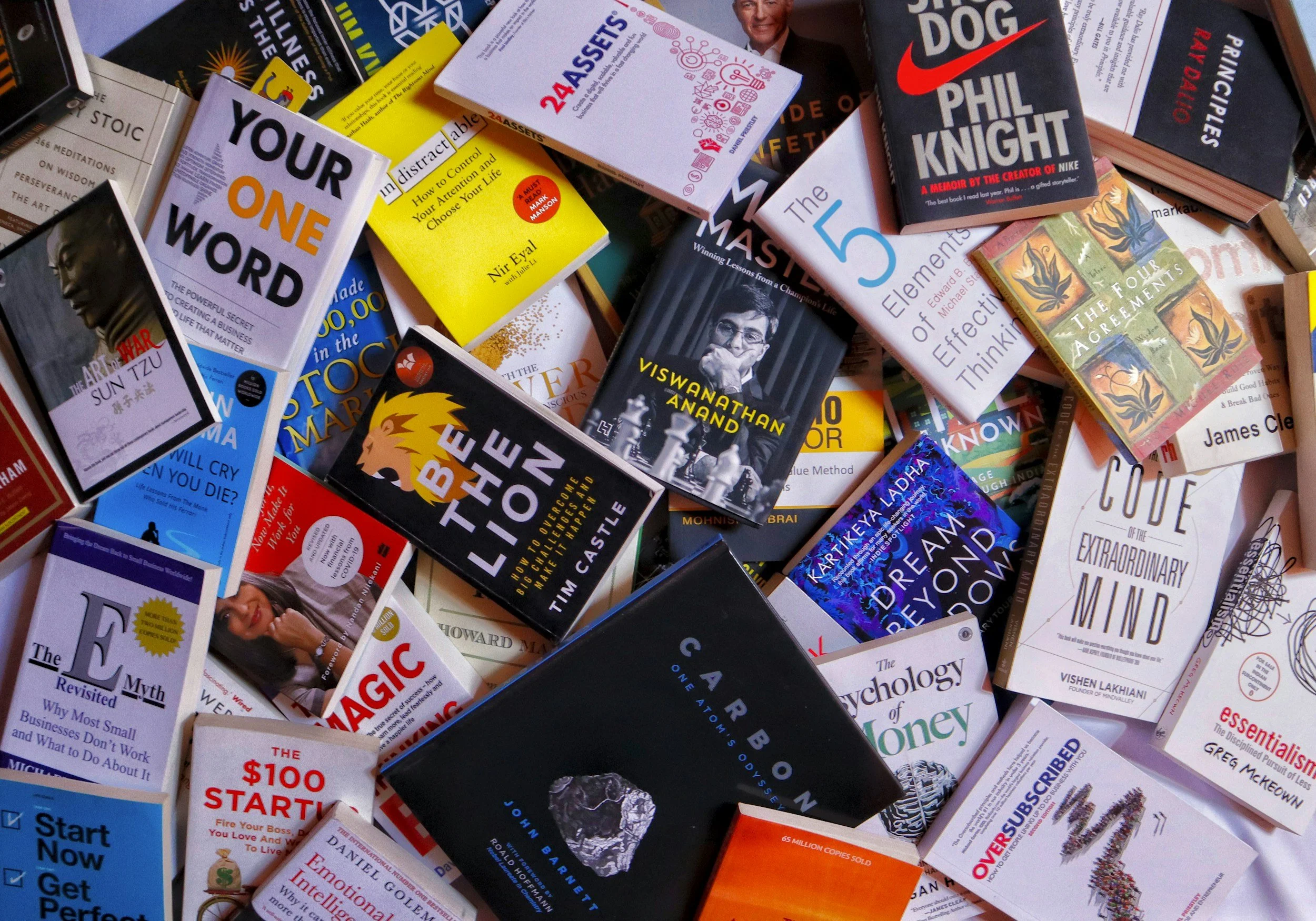 Messy pile of self-help books