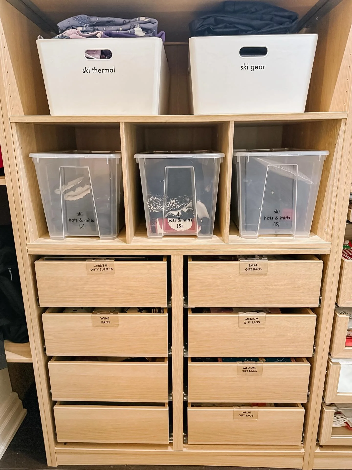 ✨12 Days of Project Reveals&mdash; Day 12✨

Basement storage with intention. Clear zones for gift wrap, travel, off-season clothing, and seasonal decor mean everything has a home&mdash;and stays that way.
🌲 Christmas takedown (and every season after