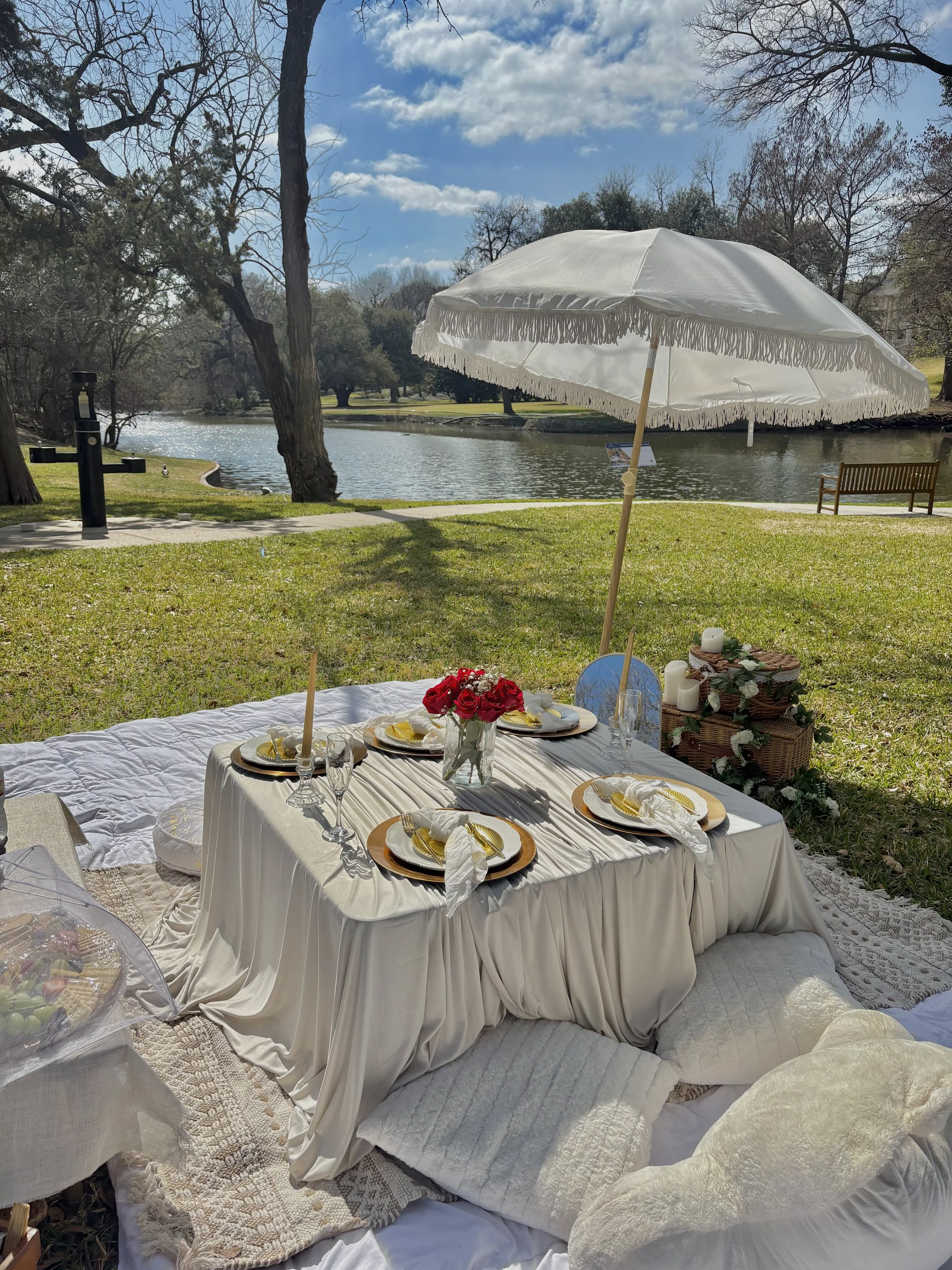 Luxury date night picnic setup at White Rock Lake in Dallas