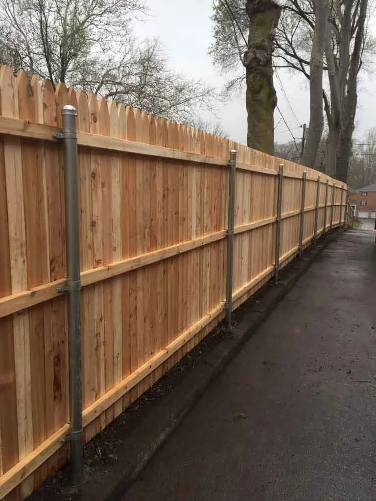 Wood Fence Craftsmanship: Trust Empire Fence for meticulous attention to detail in every installation.