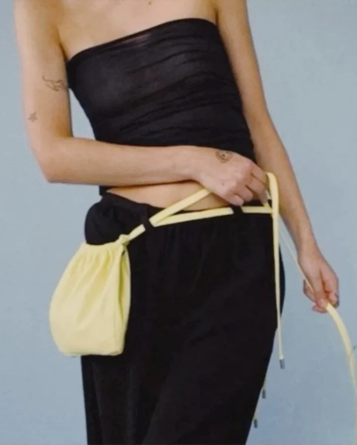 love this little bag 

look 1: sheer gathered top, convertible cinch bag, drop waist crepe trouser 

look 2: convertible cuff button down, drop waist crepe trouser 

look 3: linen blend gathered mini skirt 

look 4: asymmetrical linen blend midi skir