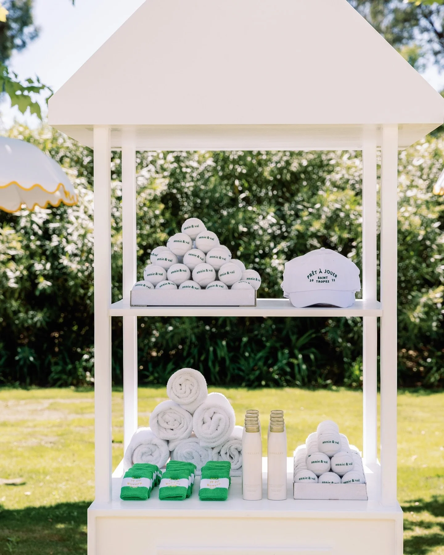 The details made the party! Thinking back to last May at @airellessainttropez The tennis, market stalls, delicious food &amp; drinks, and a signature pattern tying it all together. From stall graphics to branded tennis balls, bags, towels, hats, swea