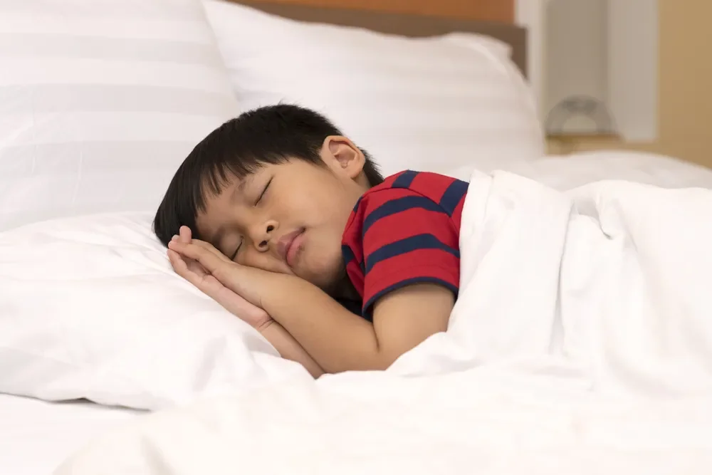 Asian boy sleeping soundly