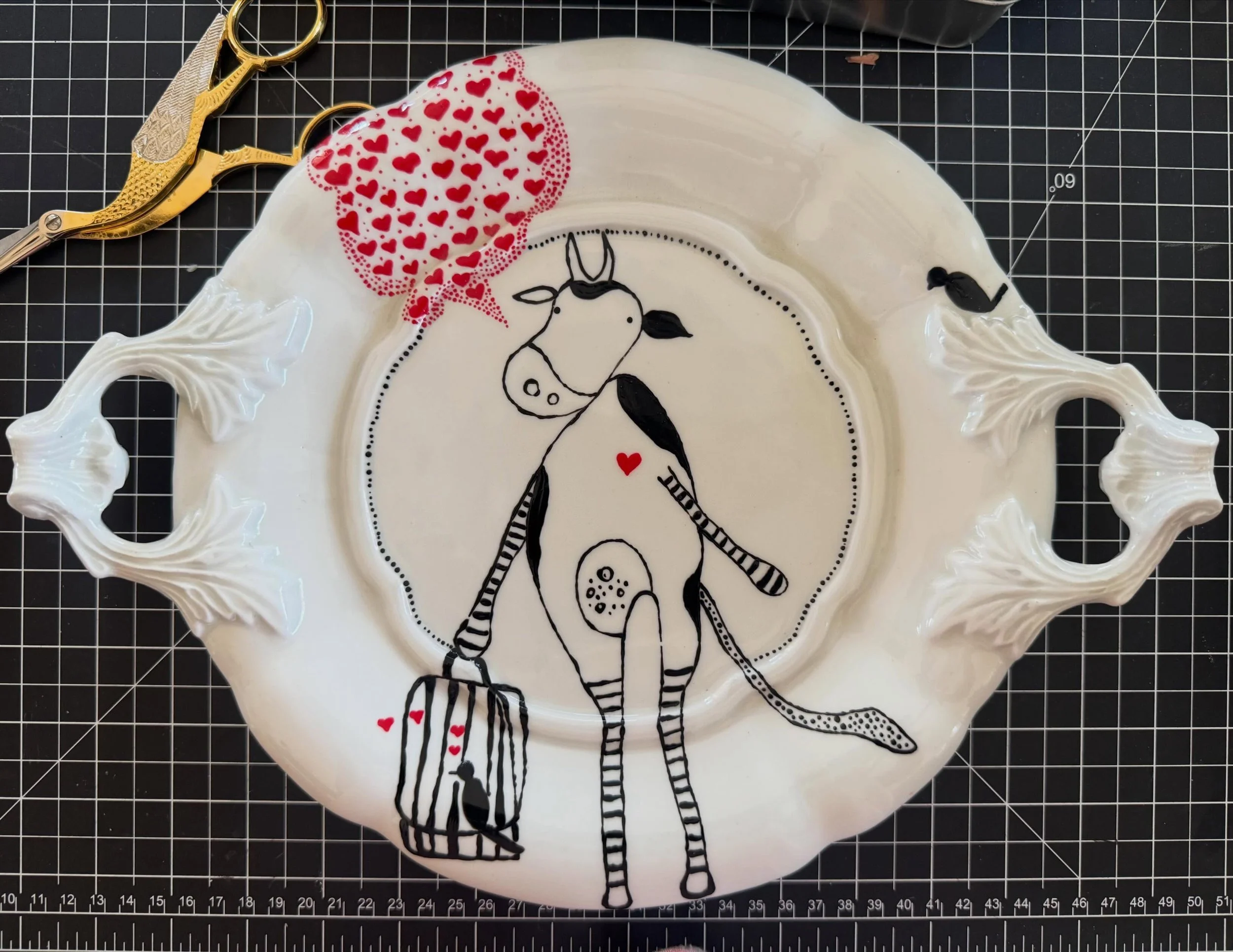 Years ago, I used to love thrifting for porcelain and painting them for fun.  This is one of my favorite pieces.