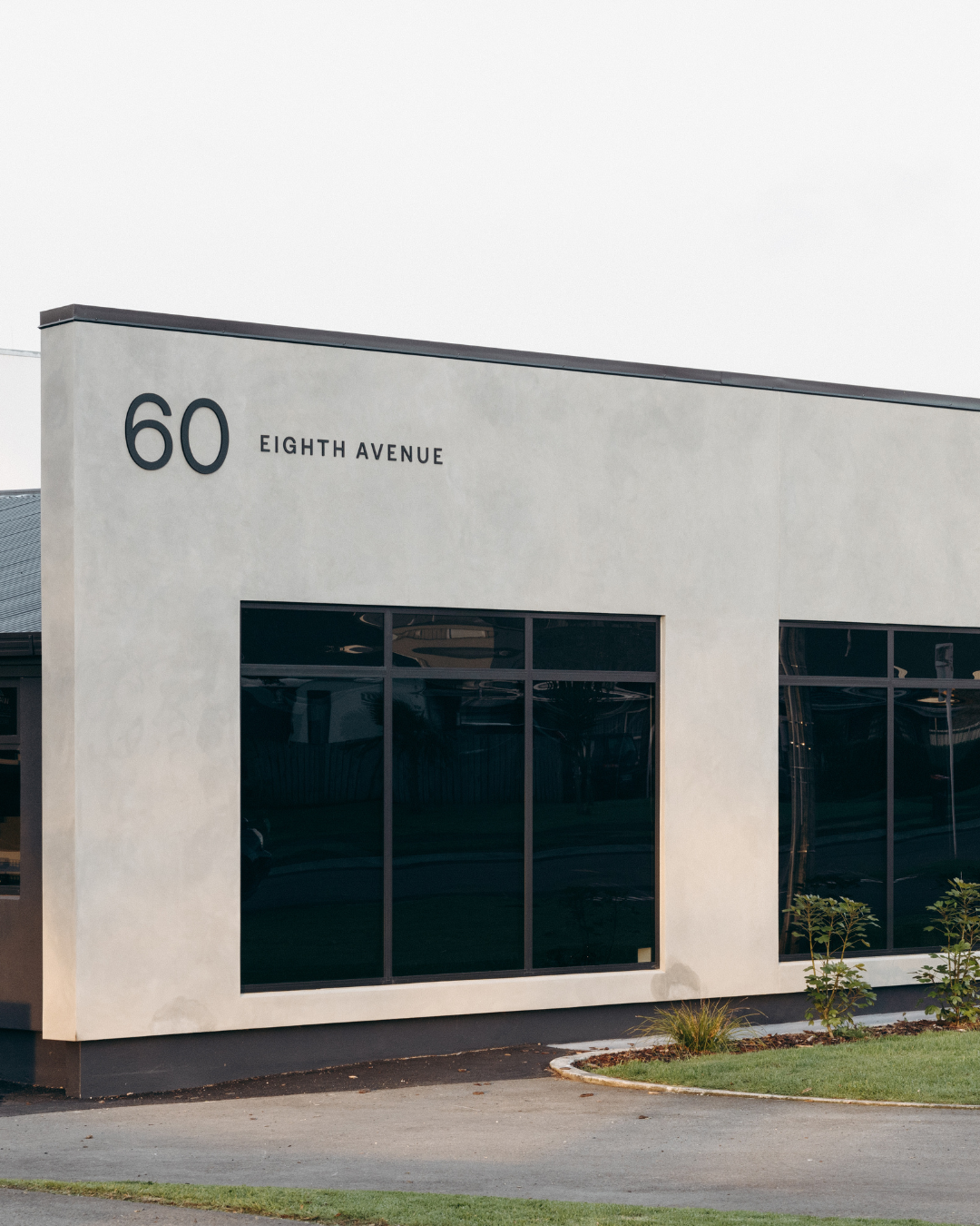 Concrete by Novacolor exterior at Sutcliffe Graham, Tauranga