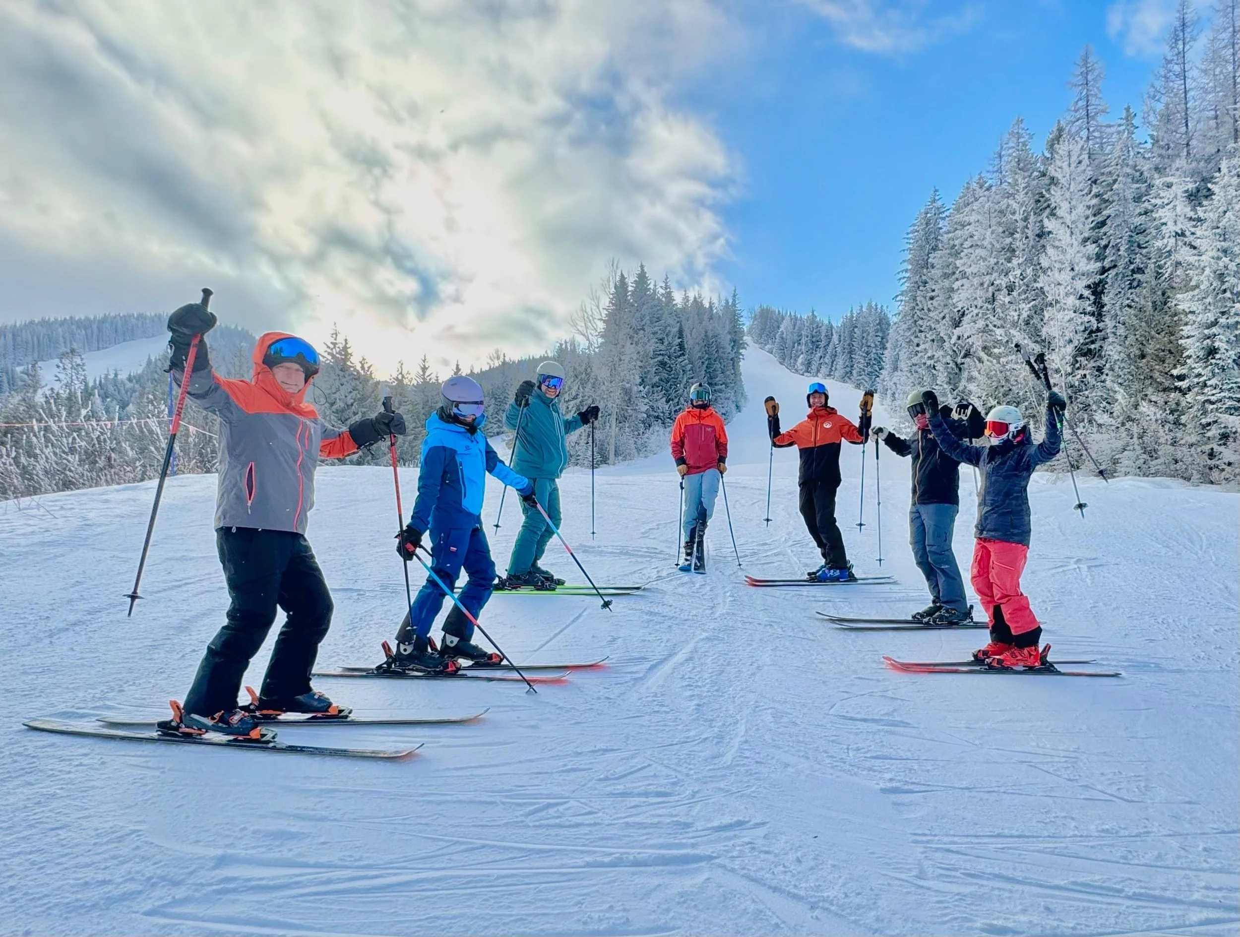 Adult ski camp participants working on technique and confidence