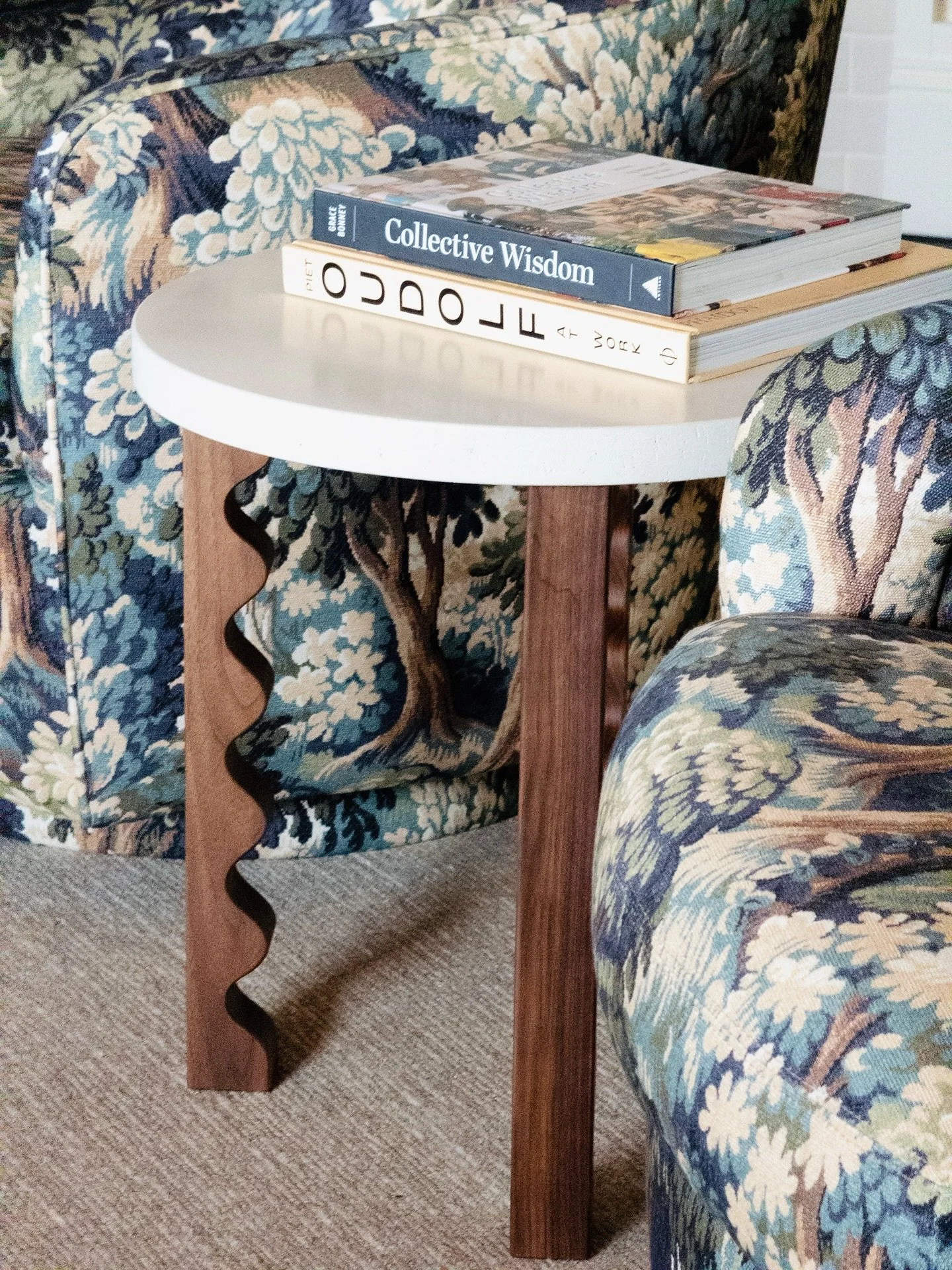 Our Wave of Change table from tells such a beautiful story. The stone top is actually our concrete with recycled styrofoam hidden. You can see books&rsquo; reflection, that&rsquo;s the level of quality. 

The legs are made from fallen trees in our ar
