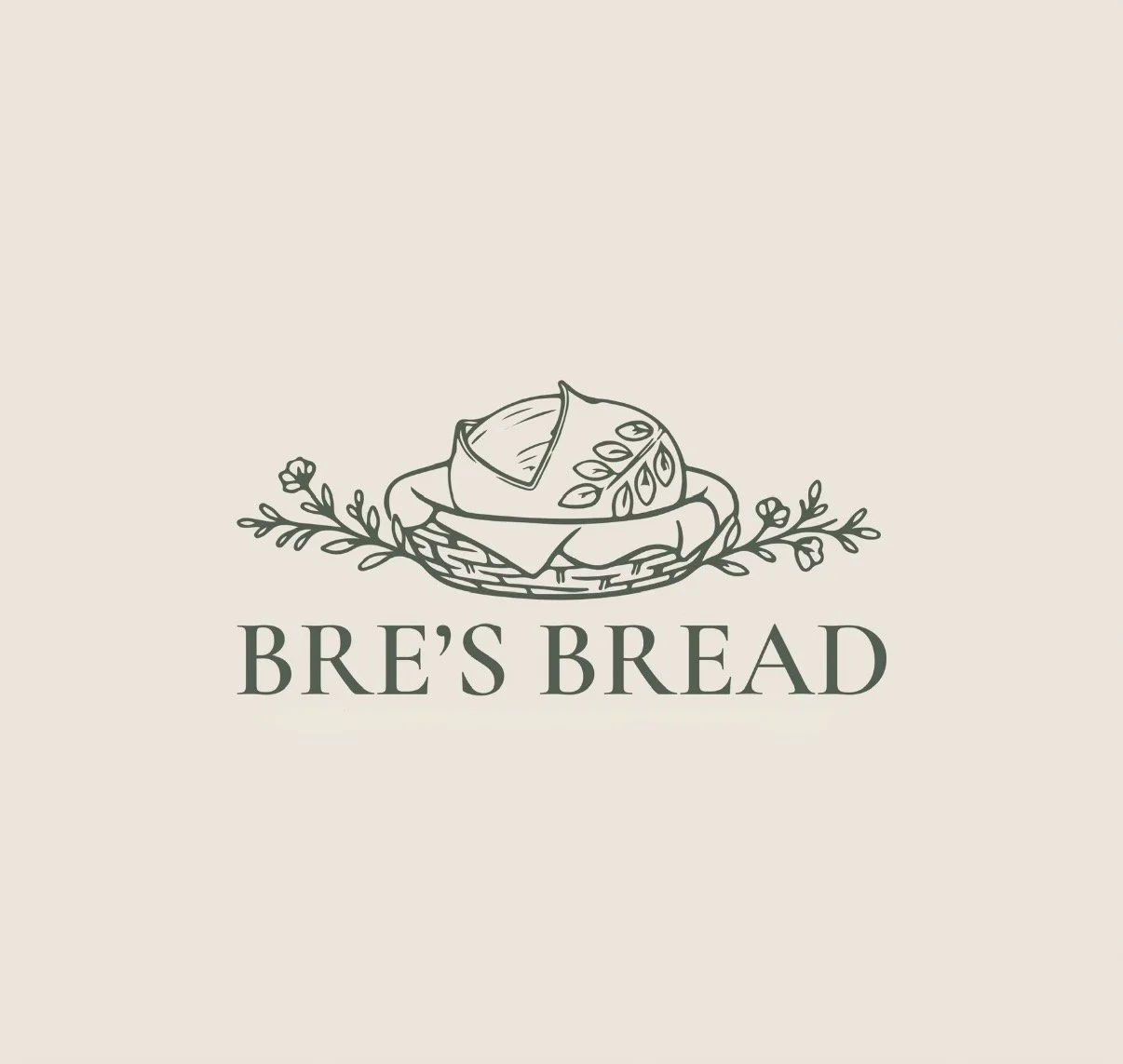 Logo for Bre's Bread featuring a basket of bread with decorative leaves.