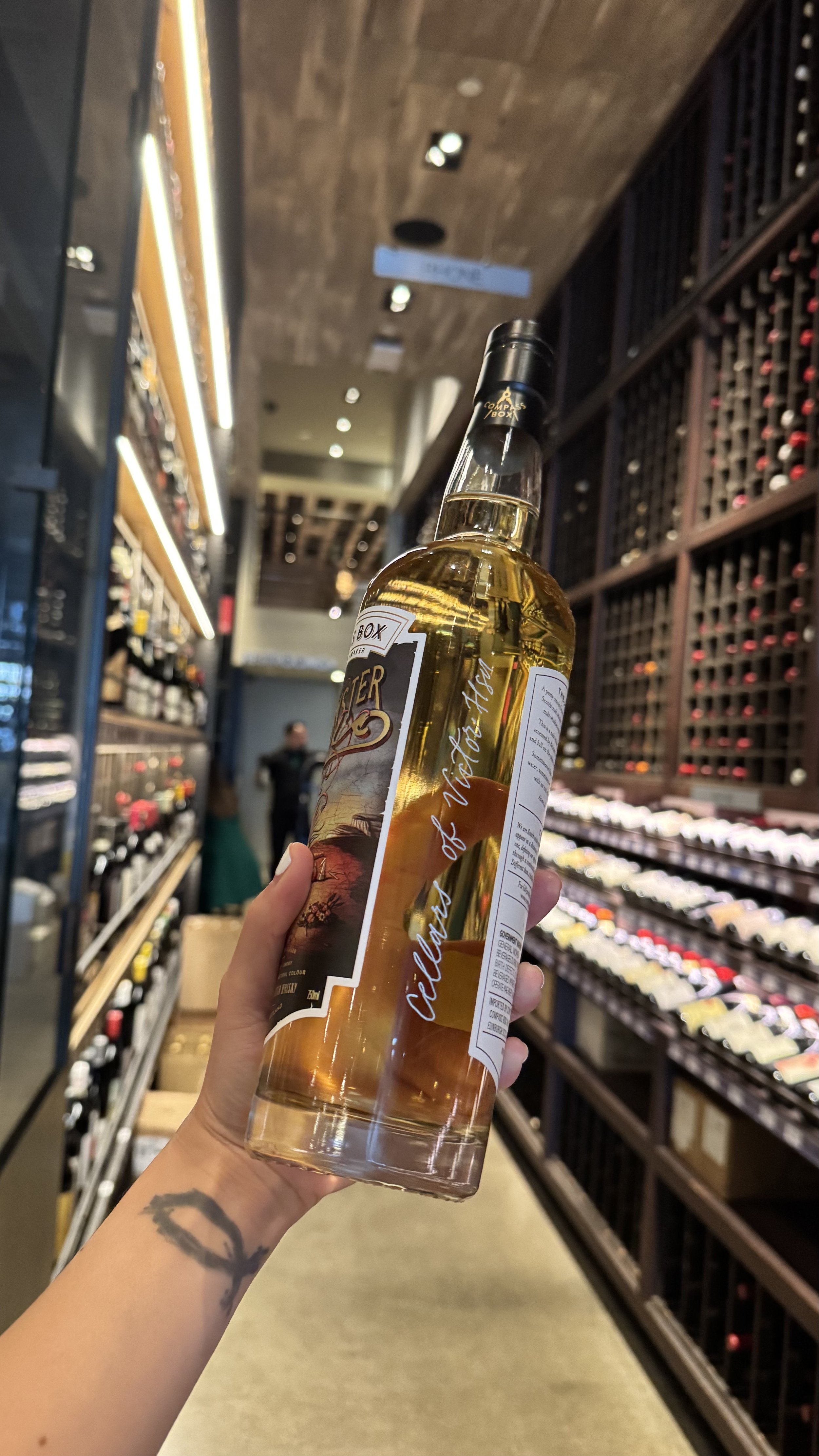 Whiskey Engraving Brand Activation for Compass Box Whisky Tasting Event for Influencers Los Angeles Wallys Santa Monica Engraving Calligraphy Artist Stacy Shon Botttle Engraver.jpeg