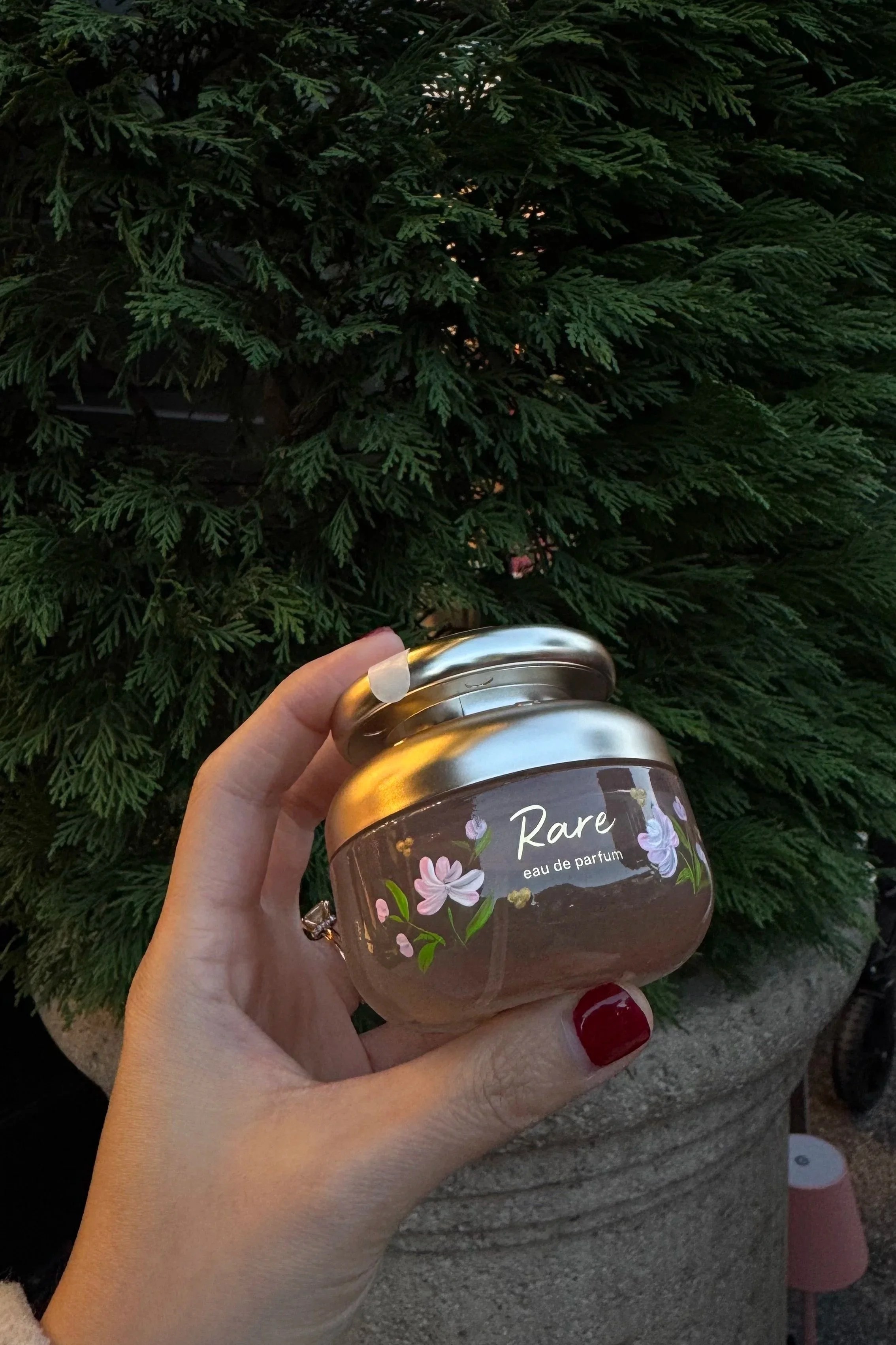 Hand painted fragrance bottle for Rare Beauty's retail store activation at Downtown Disney in Anaheim, CA