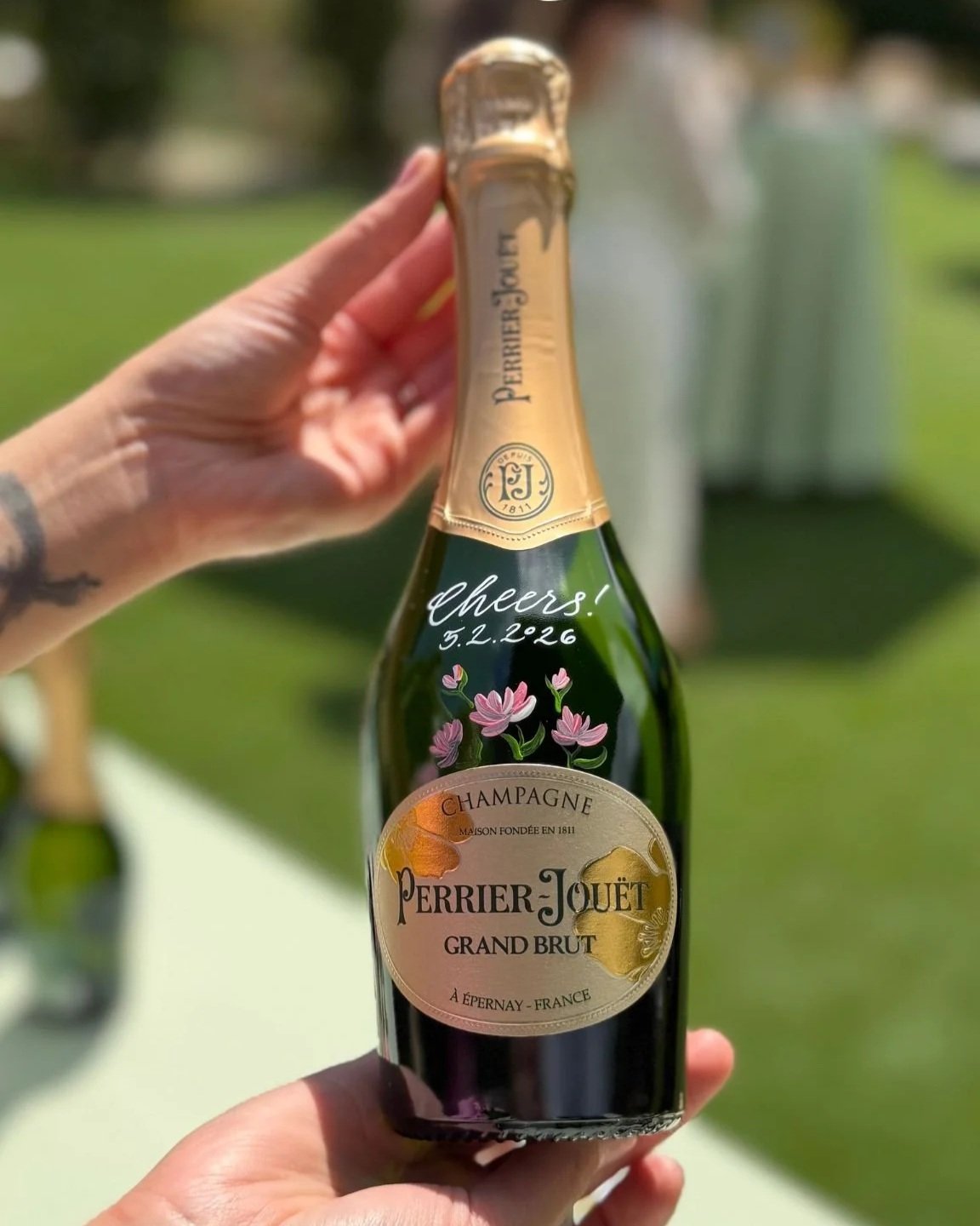 Champagne brand activation for Perrier-Jouet at San Ysidro Ranch in Montecito, CA - Hand painted personalized bottles for guests to take home as a gift