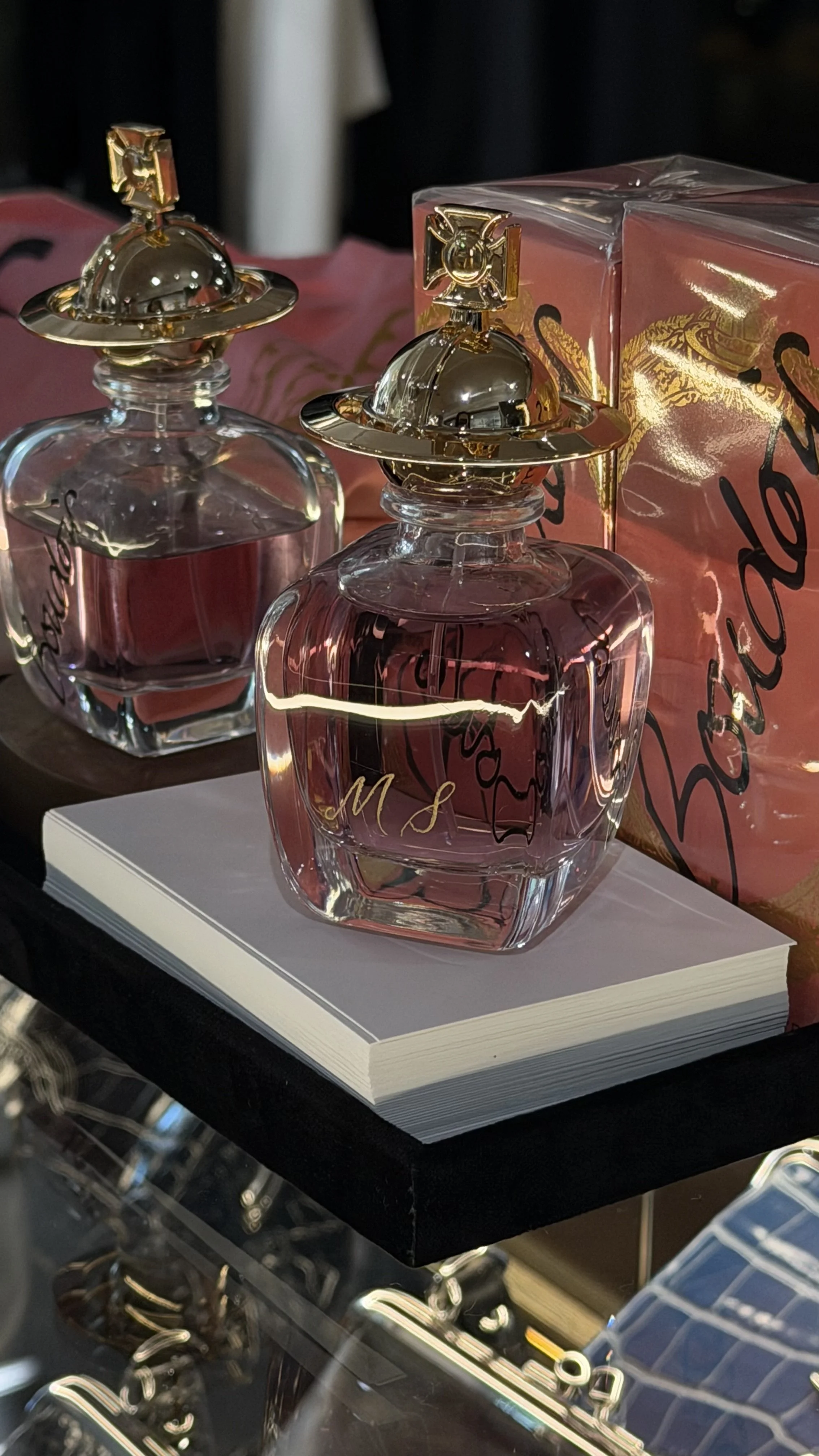 Live hand engraving for customers at Vivienne Westwood boutique in West Hollywood, CA - Mother's Day event