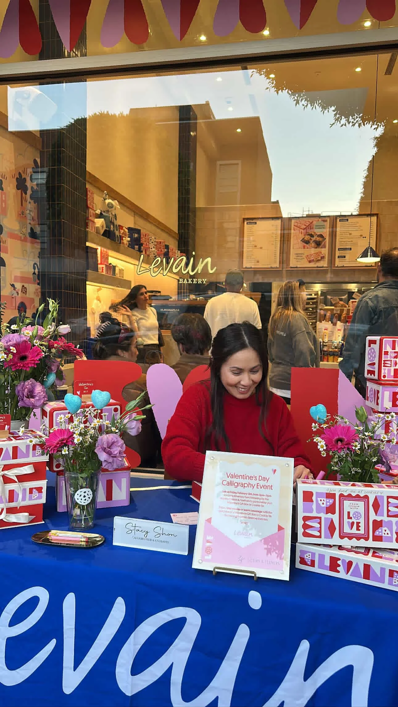 Stacy Shon personalizing gift boxes at Levain Bakery in Beverly Hills, CA for their Valentine's Day activation