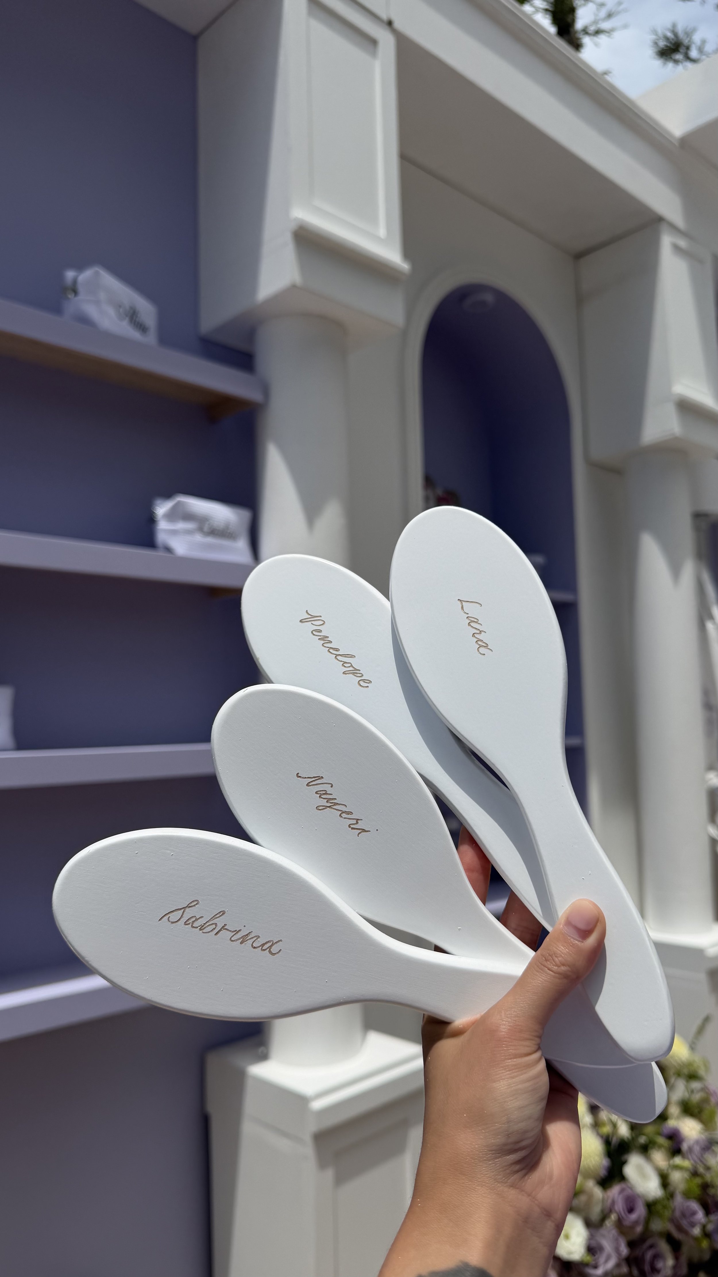 Live hand engraving on hair brushes for guests at a Bridal Shower in Arcadia, CA 