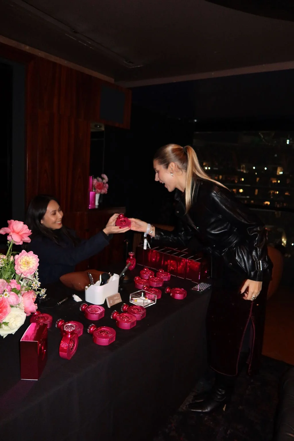 Engraving GUESS fragrance bottles at the Sabrina Carpenter concert at Crypto Arena in Downtown Los Angeles