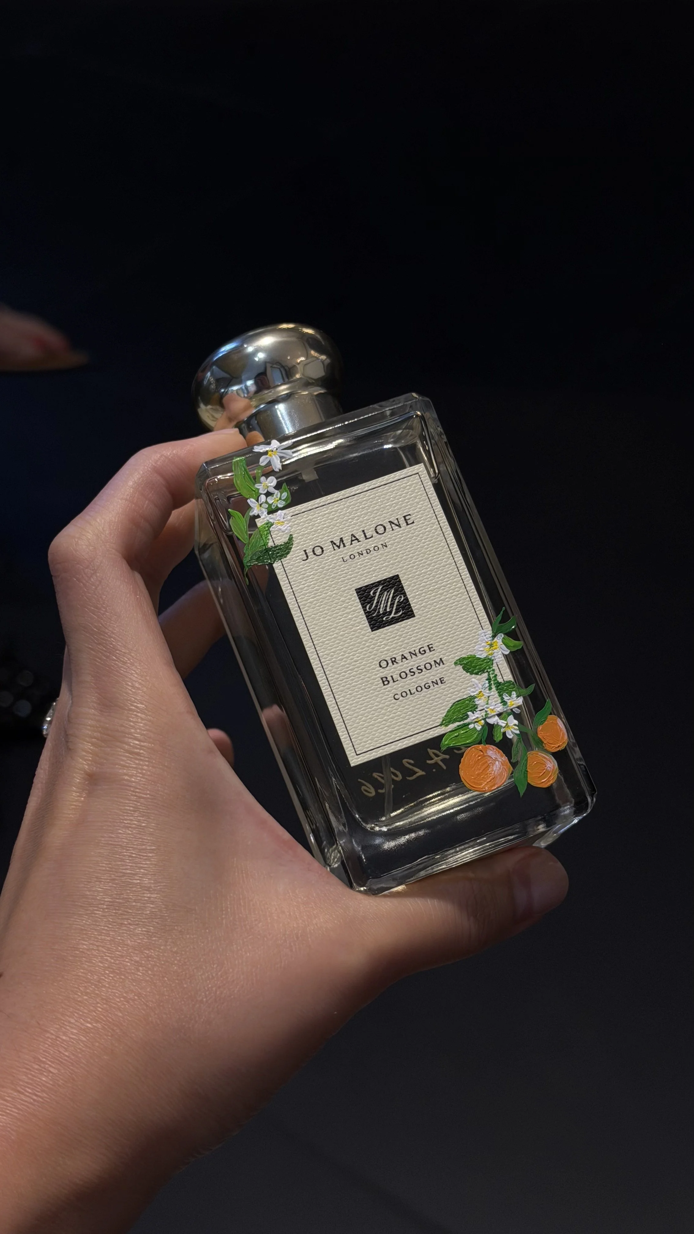 Bottle painting on Jo Malone fragrance for a customer in store (Century City Mall)