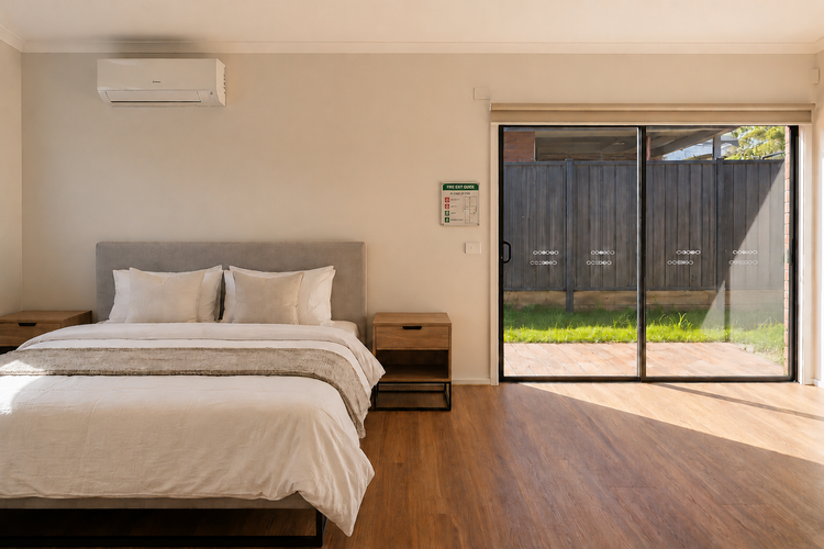 Bedroom with large sliding glass doors
