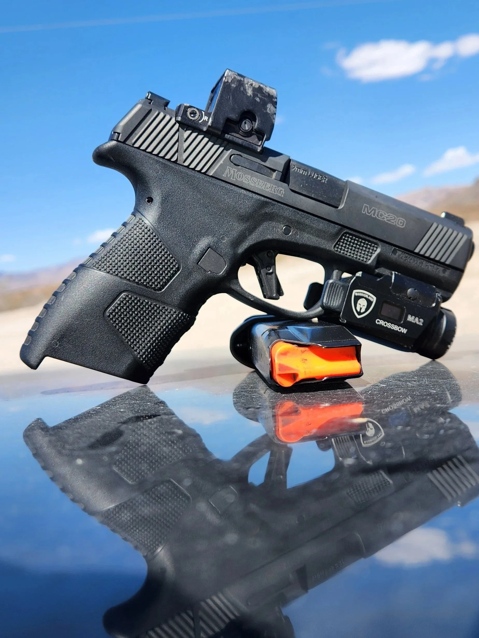 Hi-Lux TD-3E fully enclosed pistol red dot mounted on a Mossberg MC2C
