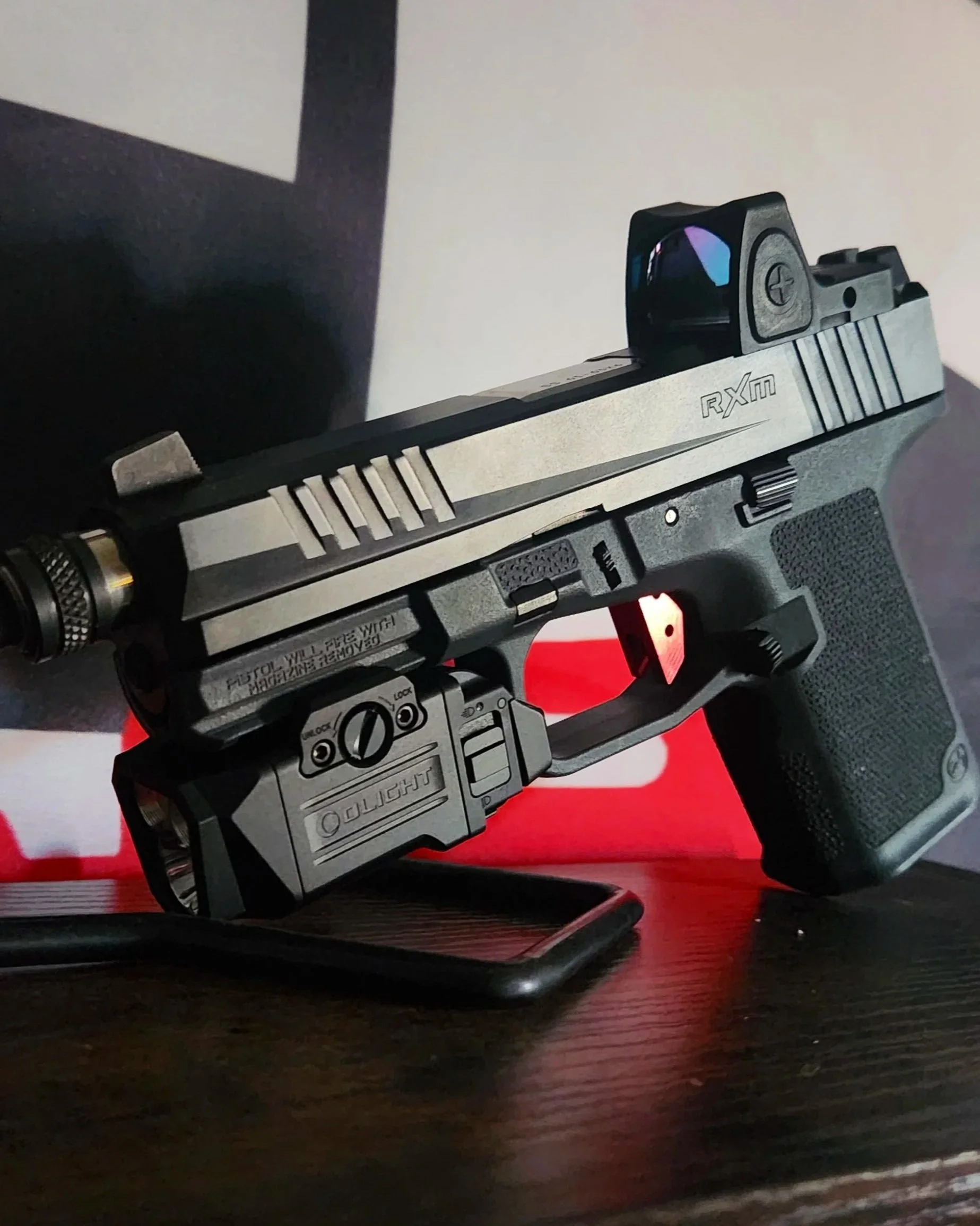 Olight PL-X pistol light mounted to a Ruger RXM
