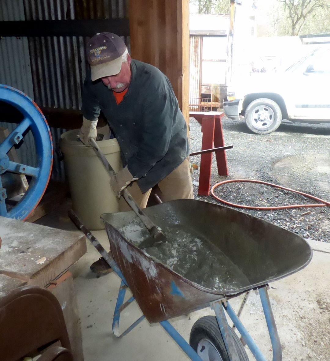 Mixing mortar for the brickwork.