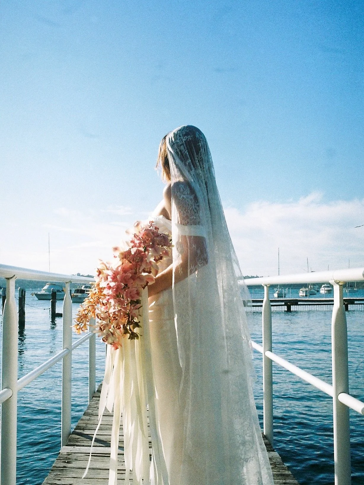 Story time &mdash; the florist becomes the bride (just for the photos)

I am desperately in love with cymbidium orchids and had this bridal bouquet with cascading orchids and ribbon on my mind for weeks.

I randomly had to go to market on an off day,