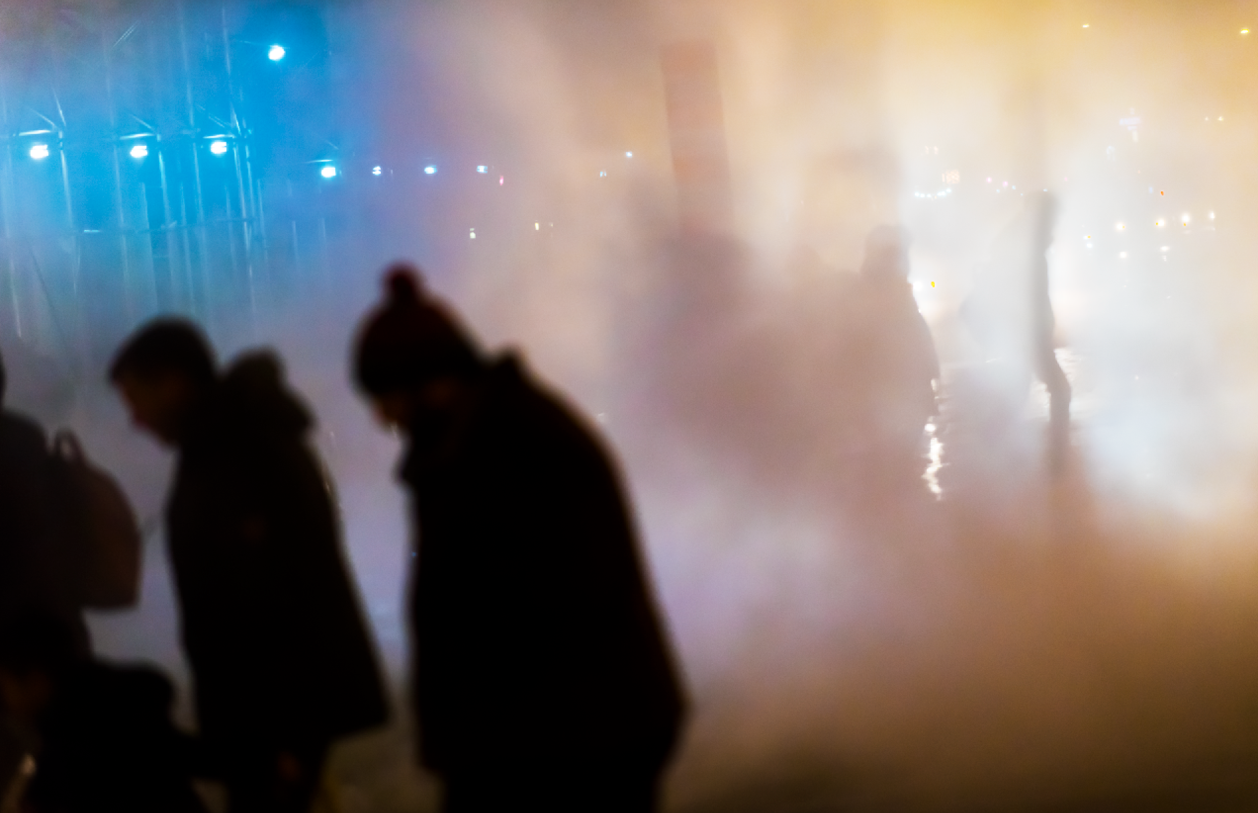 New Yorkers walk through a cloud of steam on a cold winter day in Manhattan, NY, December 2021.