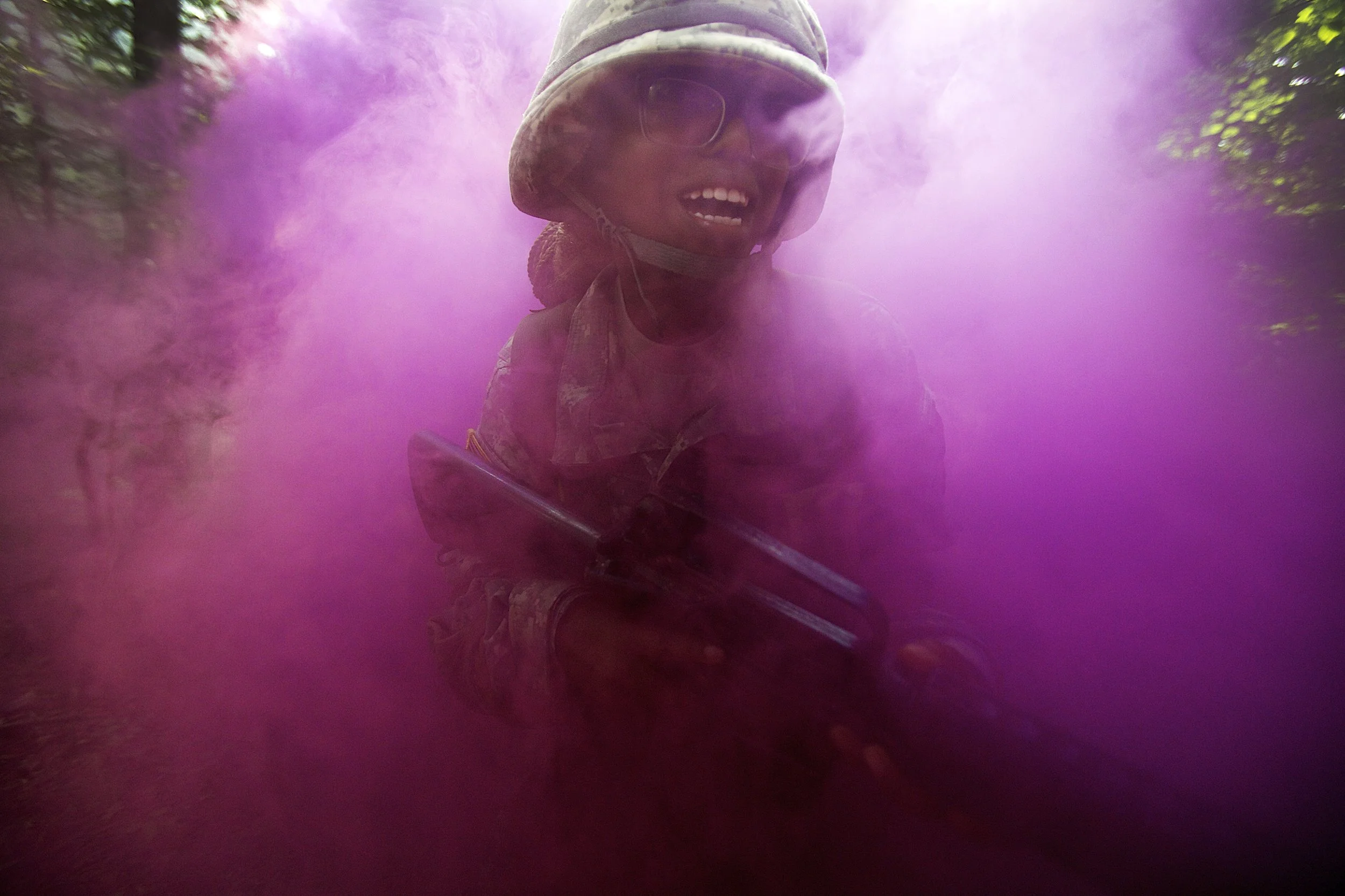 Cadet Tiara Marshall, a 21-year-old junior of Howard University, bursts through a smoke grenade on the Fort Knox assault course. “I’ve definitely never done this before; I learned a lot, but it was harder than I thought,” Marshall said.