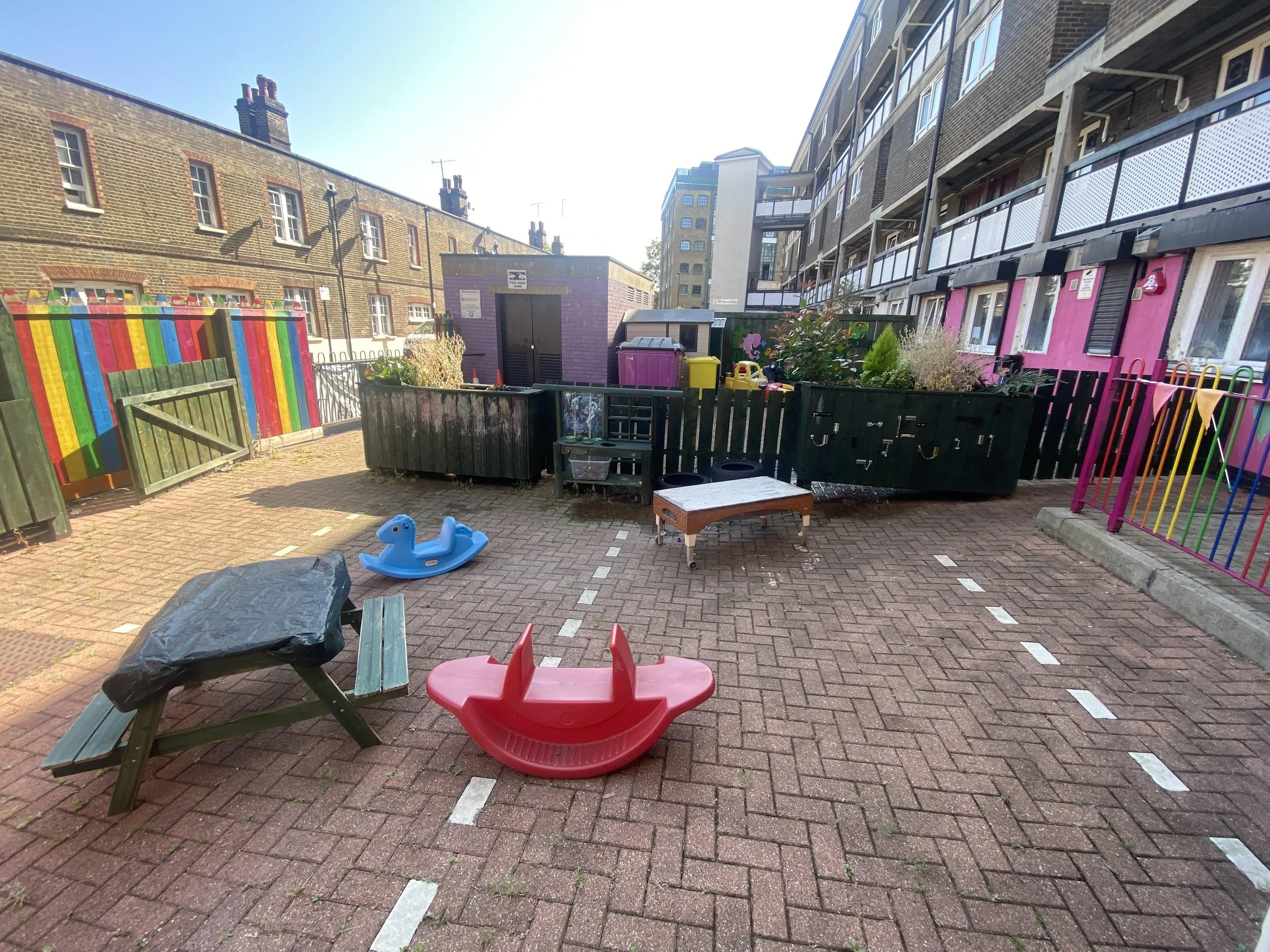 open outdoor play space for running, climbing, and active play