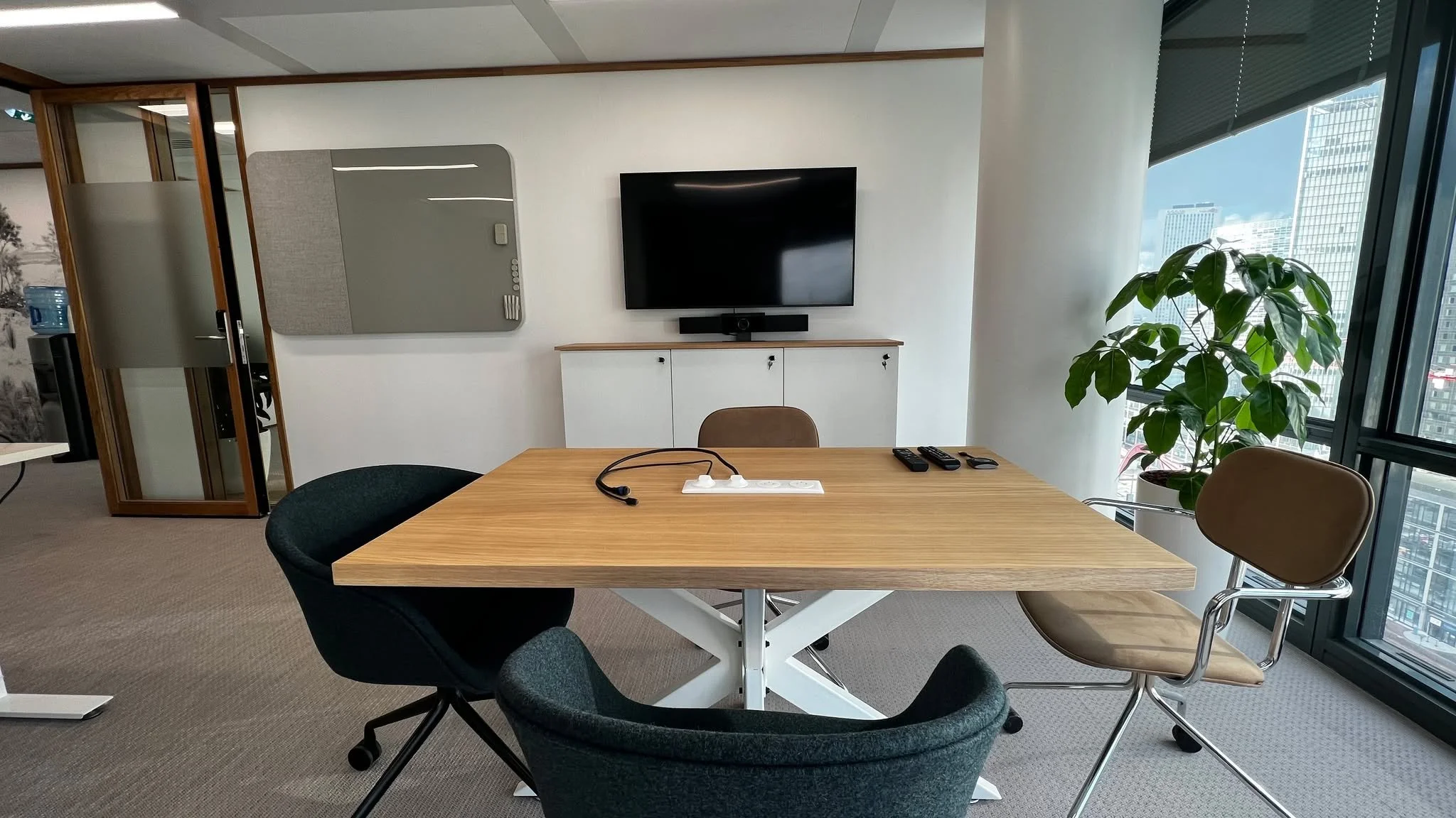 Executive office meeting space with integrated video conferencing, display, and workplace collaboration technology