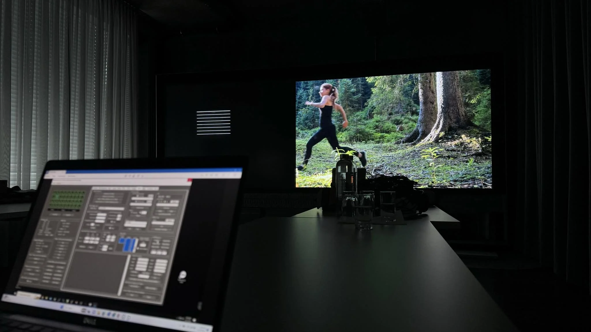 Prysm video wall displaying immersive visual content in a controlled viewing environment at the Prysm Systems Experience Briefing Centre in Frankfurt