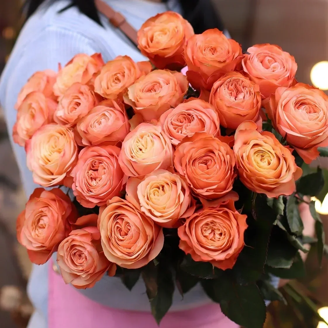 Valentine's Day Dozen Premium Rose Bouquet with Lush Greenery in Paper Wrap, available at Meadow Edge Blooms for elegant gifting.