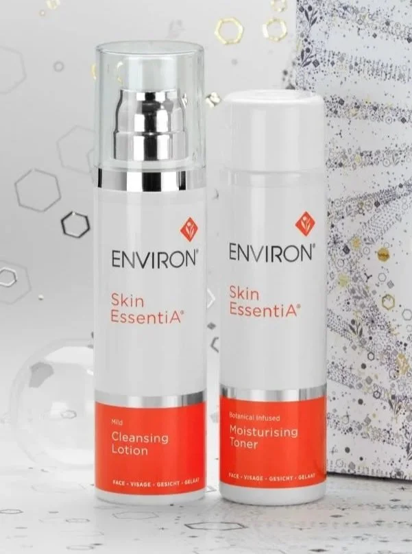 Environ Mild Cleansing Lotion and Botanical Infused Moisturizing Toner bottles side by side