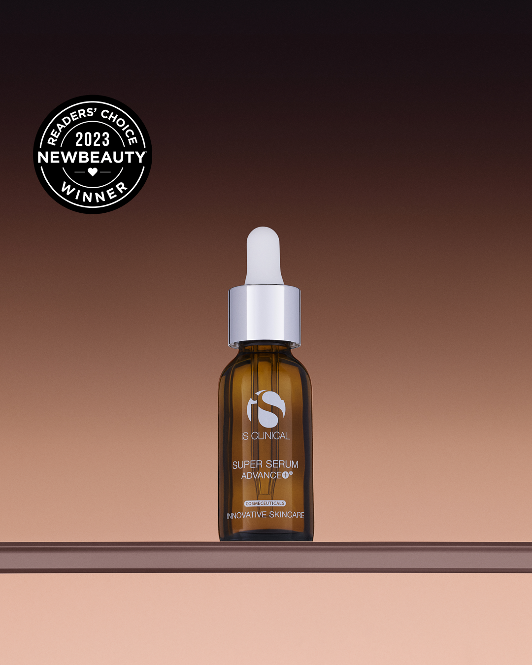 Bottle of iS Clinical Super Serum Advance+, a vitamin C serum with copper peptides for firming and anti-aging support